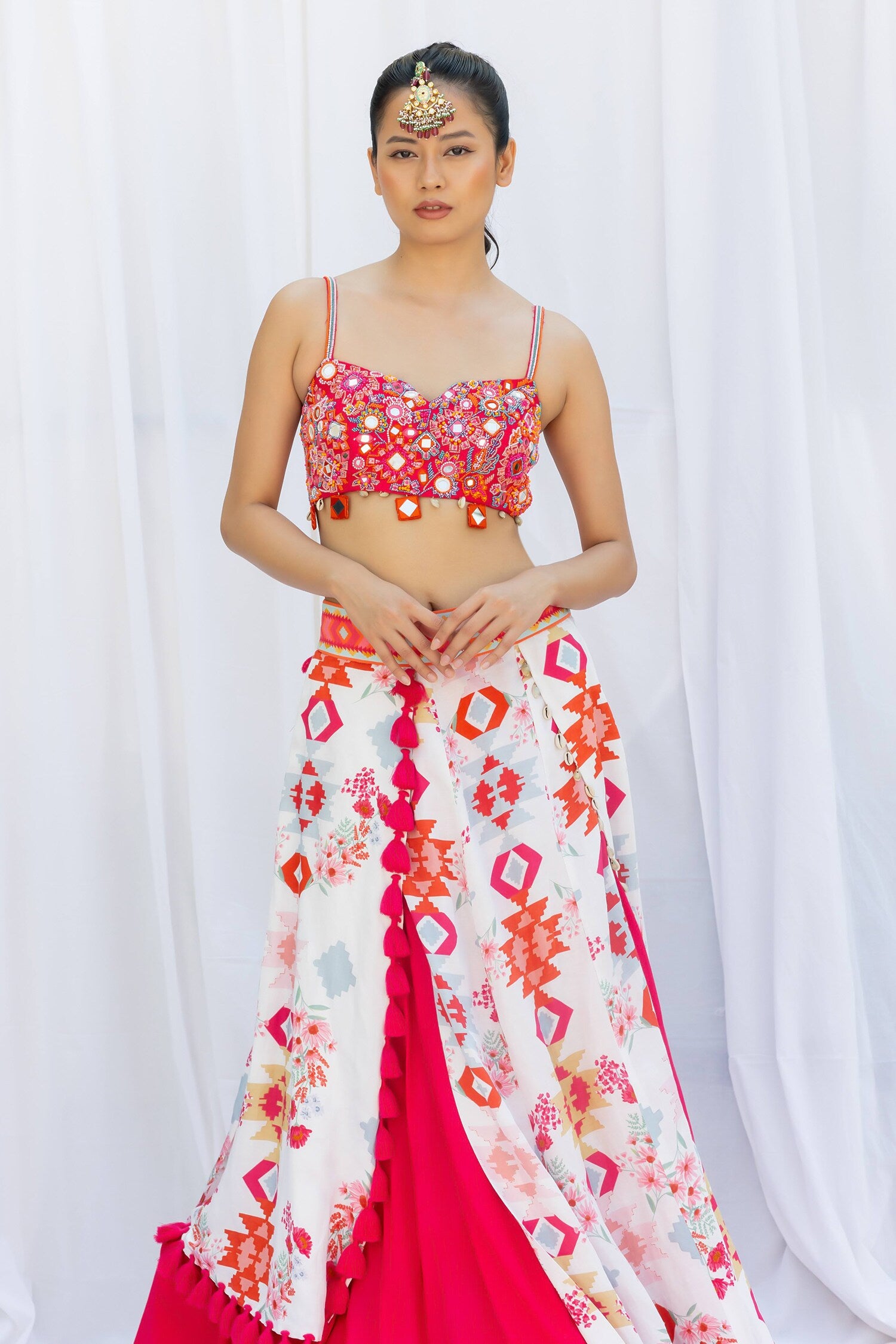 Fuchsia pink lehengas set with white kilim printed panels