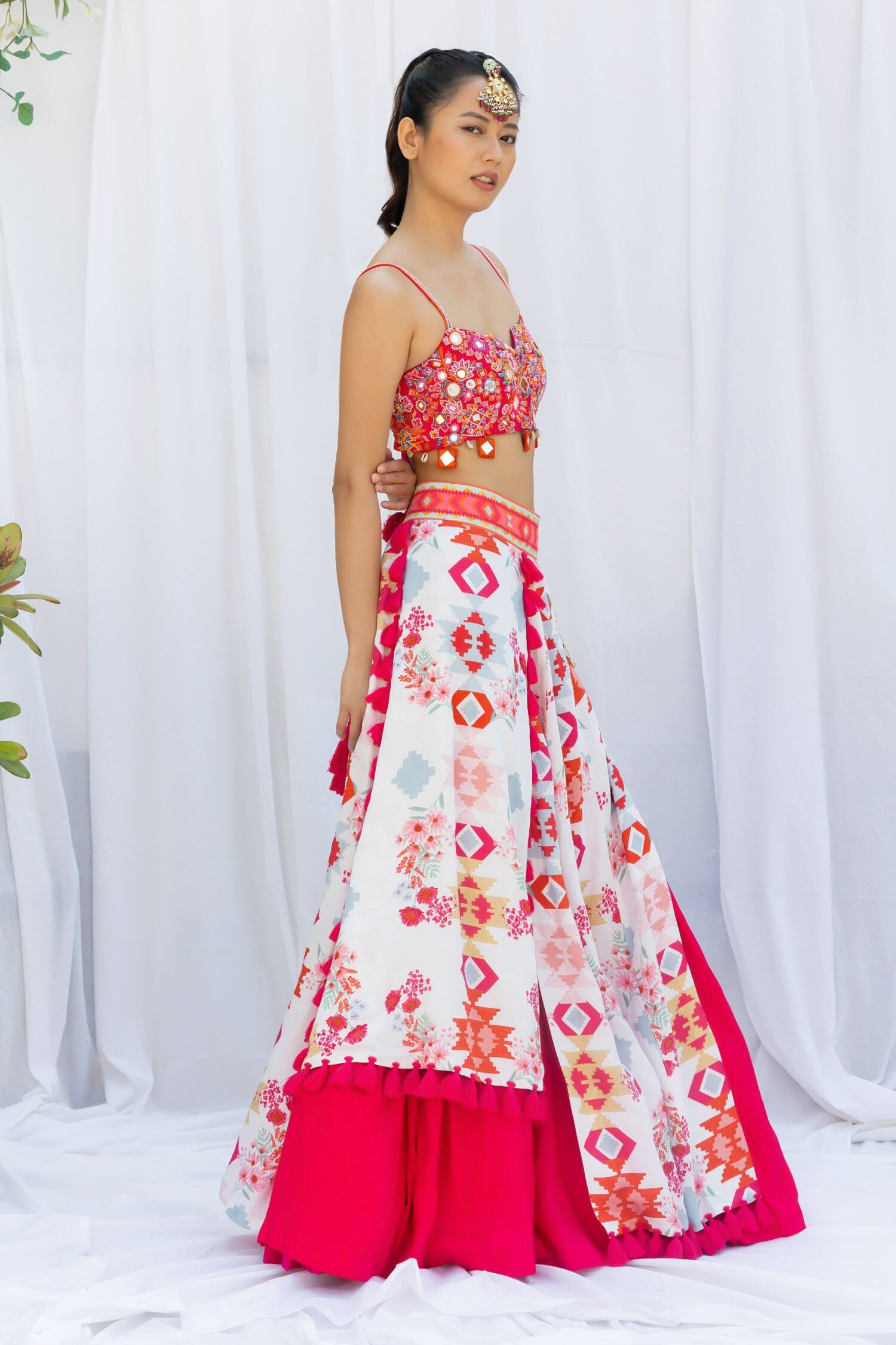 Fuchsia pink lehengas set with white kilim printed panels