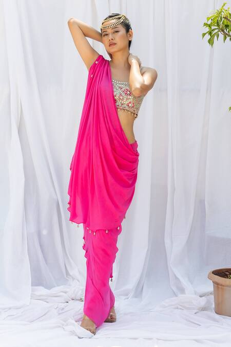 Fuchsia pink draped saree with embroidered choli
