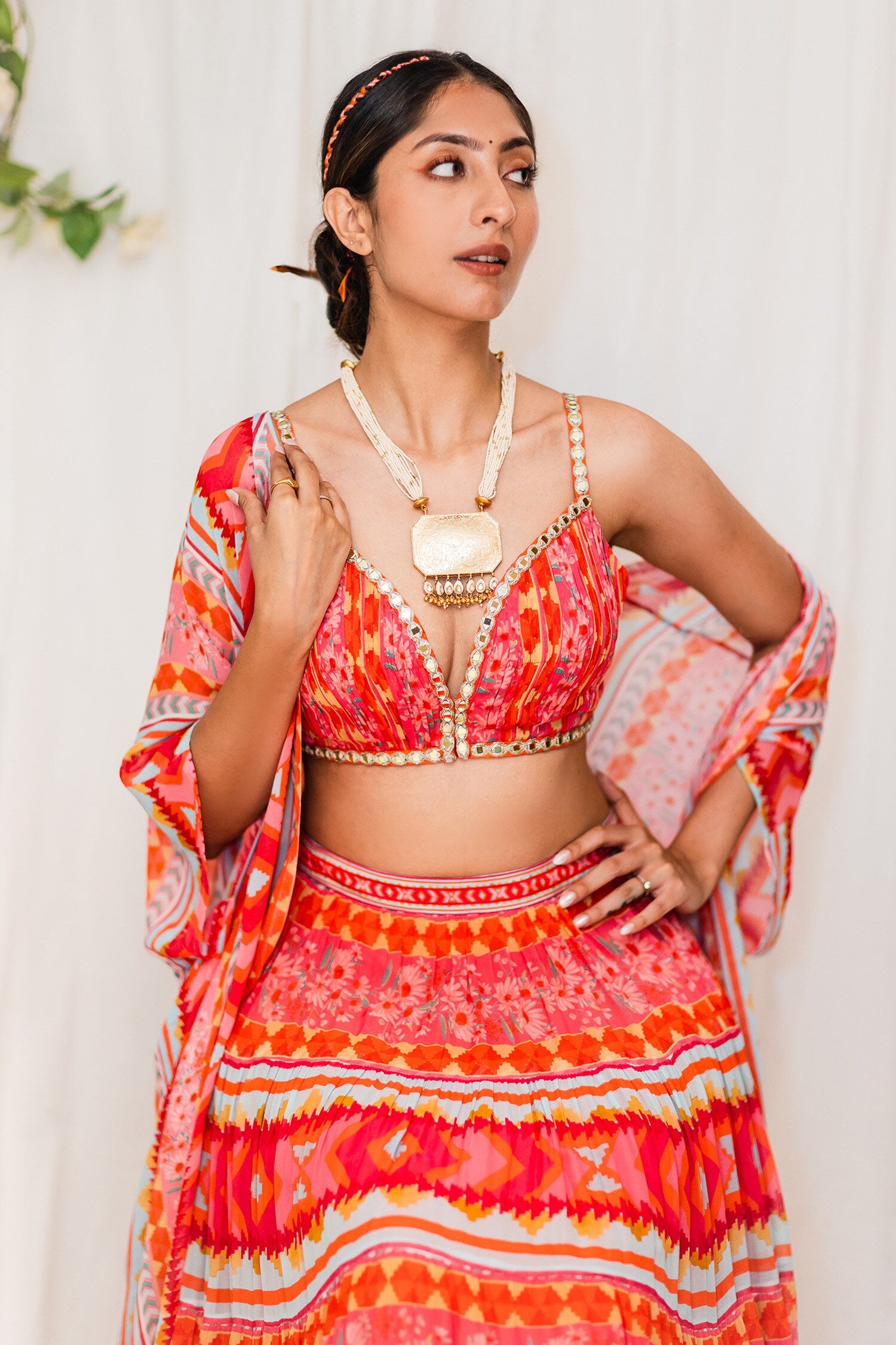 Orange Kilim printed tiered Lehenga