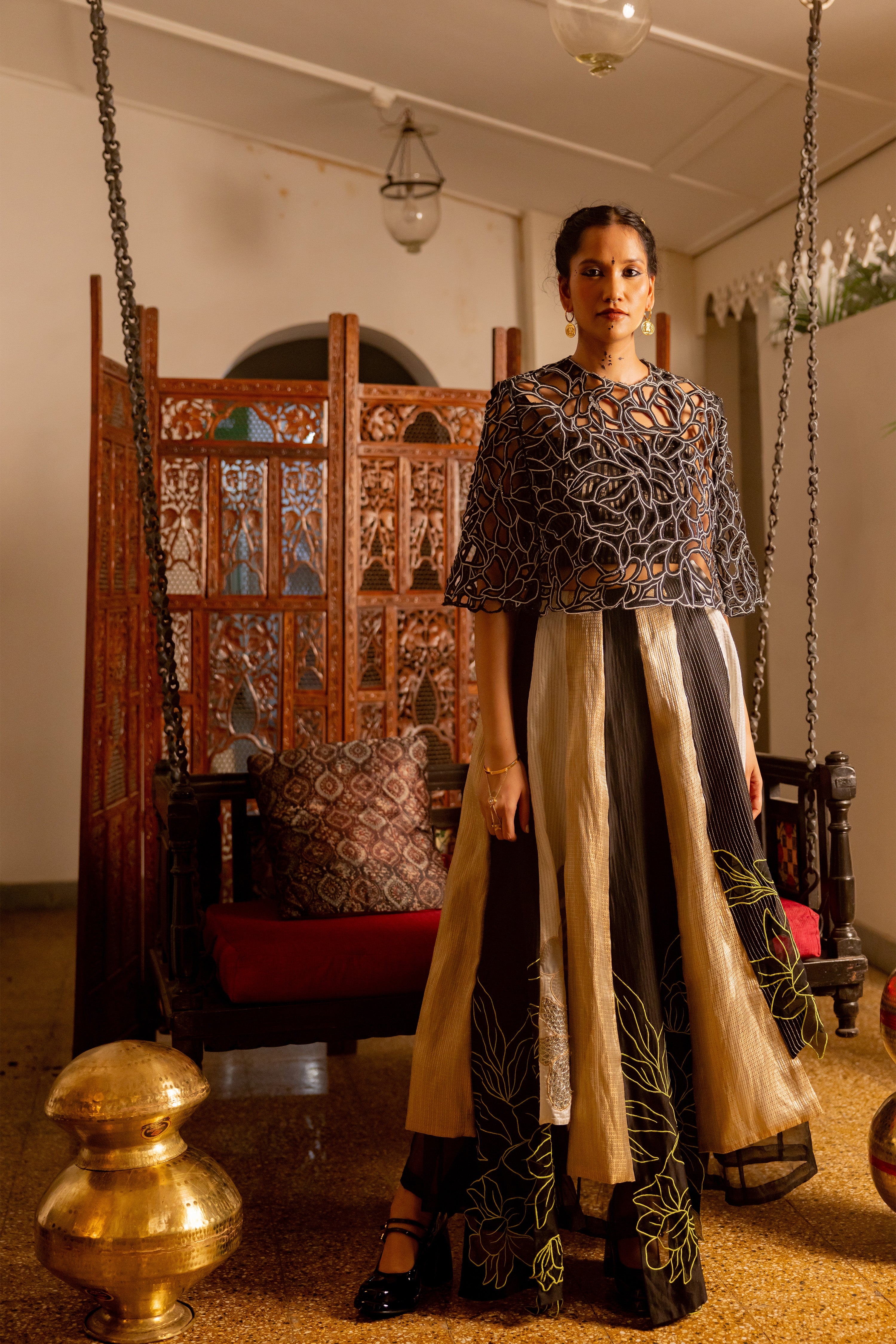 BLACK CUTOUT CAPE WITH PANEL SKIRT (Alexa)