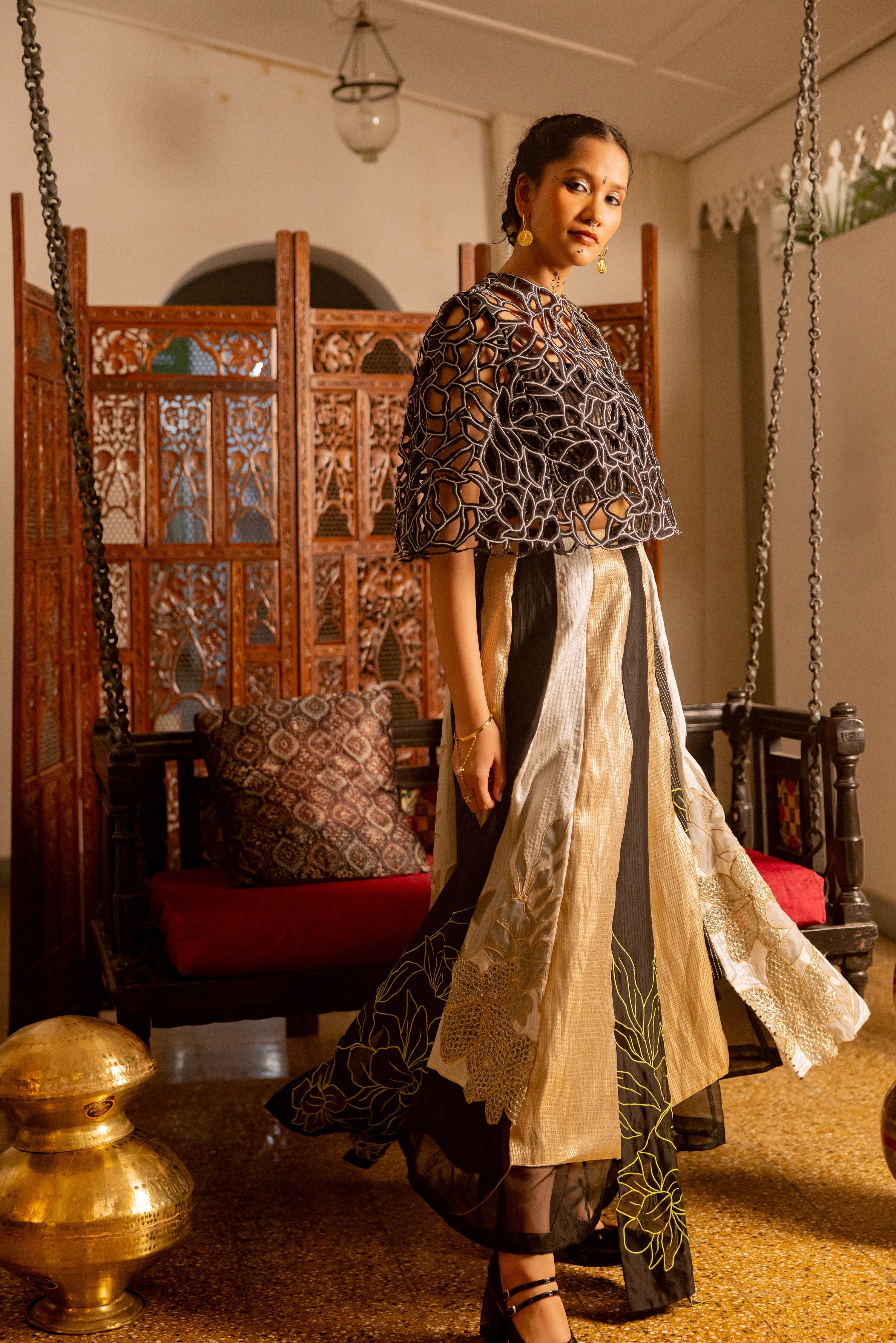 BLACK CUTOUT CAPE WITH PANEL SKIRT (Alexa)