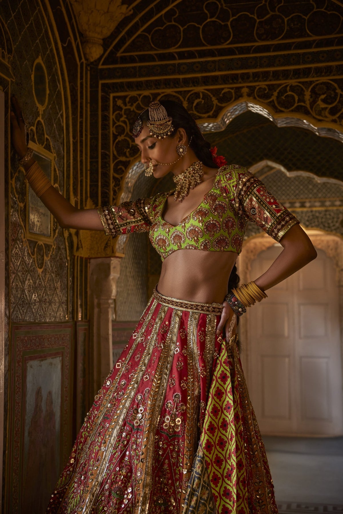 Green And Red Lehenga Set With Traditional Prints