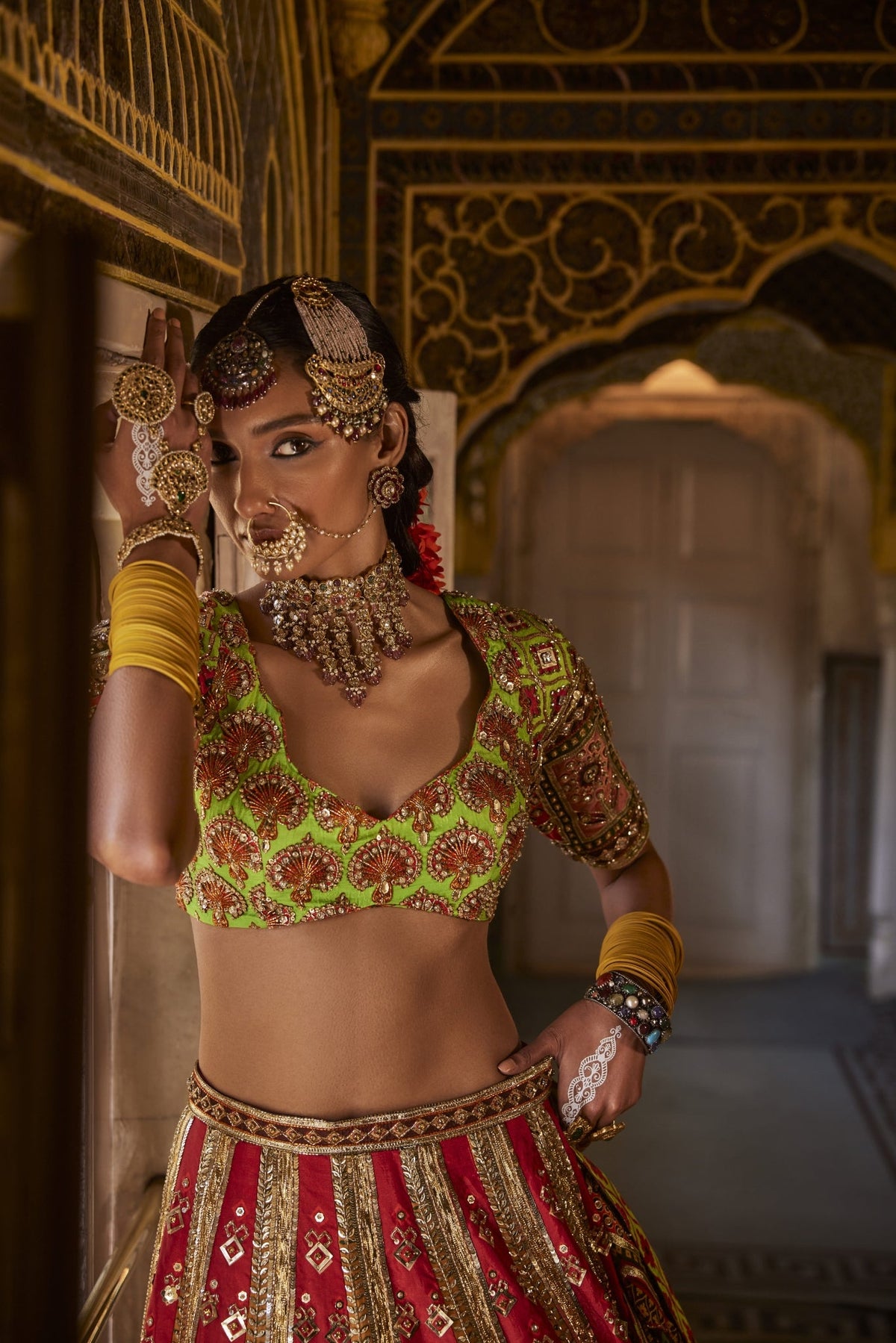 Green And Red Lehenga Set With Traditional Prints