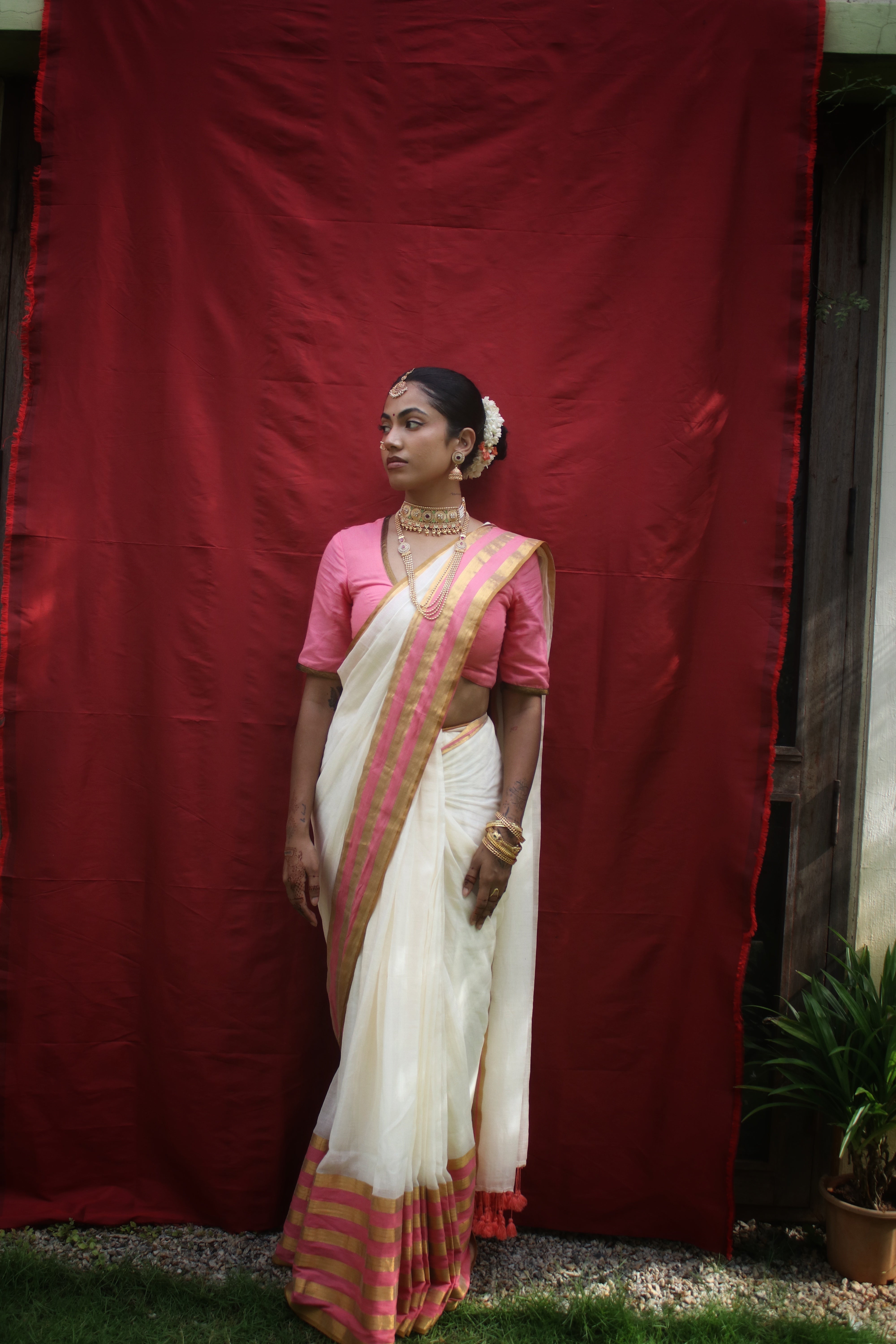 Chandramaya I White Cotton Saree with Pink and Golden Striped Border