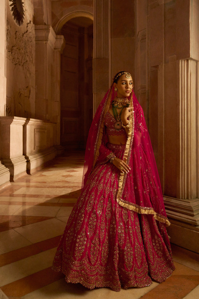 Fuchsia Red Raw Silk Bridal Lehenga Choli with a Tulle Dupatta and an Optional Second Tulle Dupatta