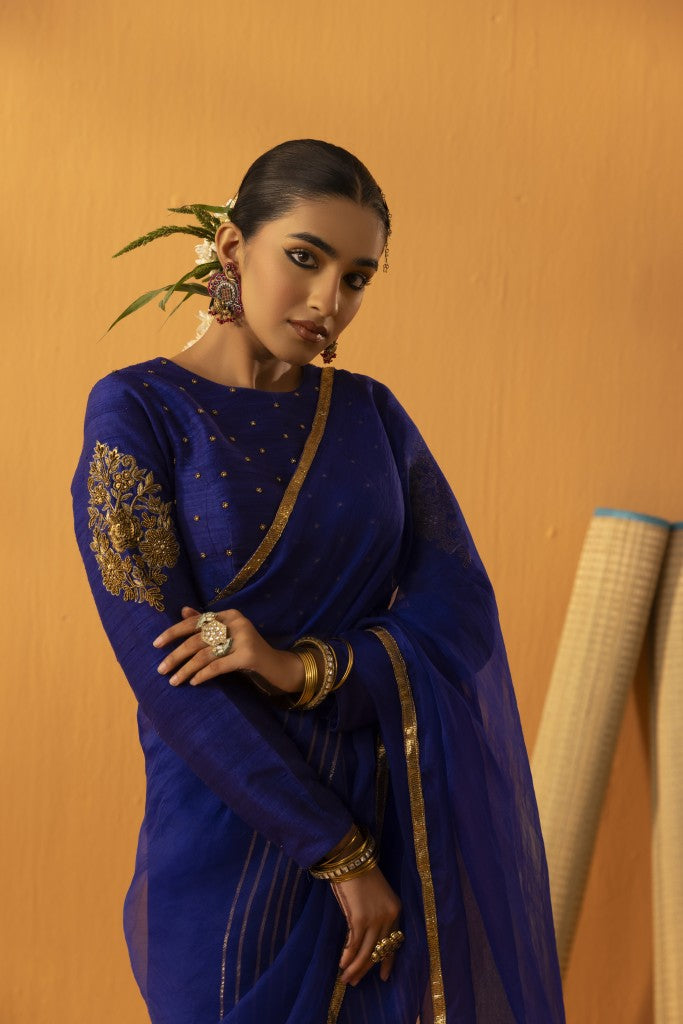 Neeltara magnetic blue embroidered saree set