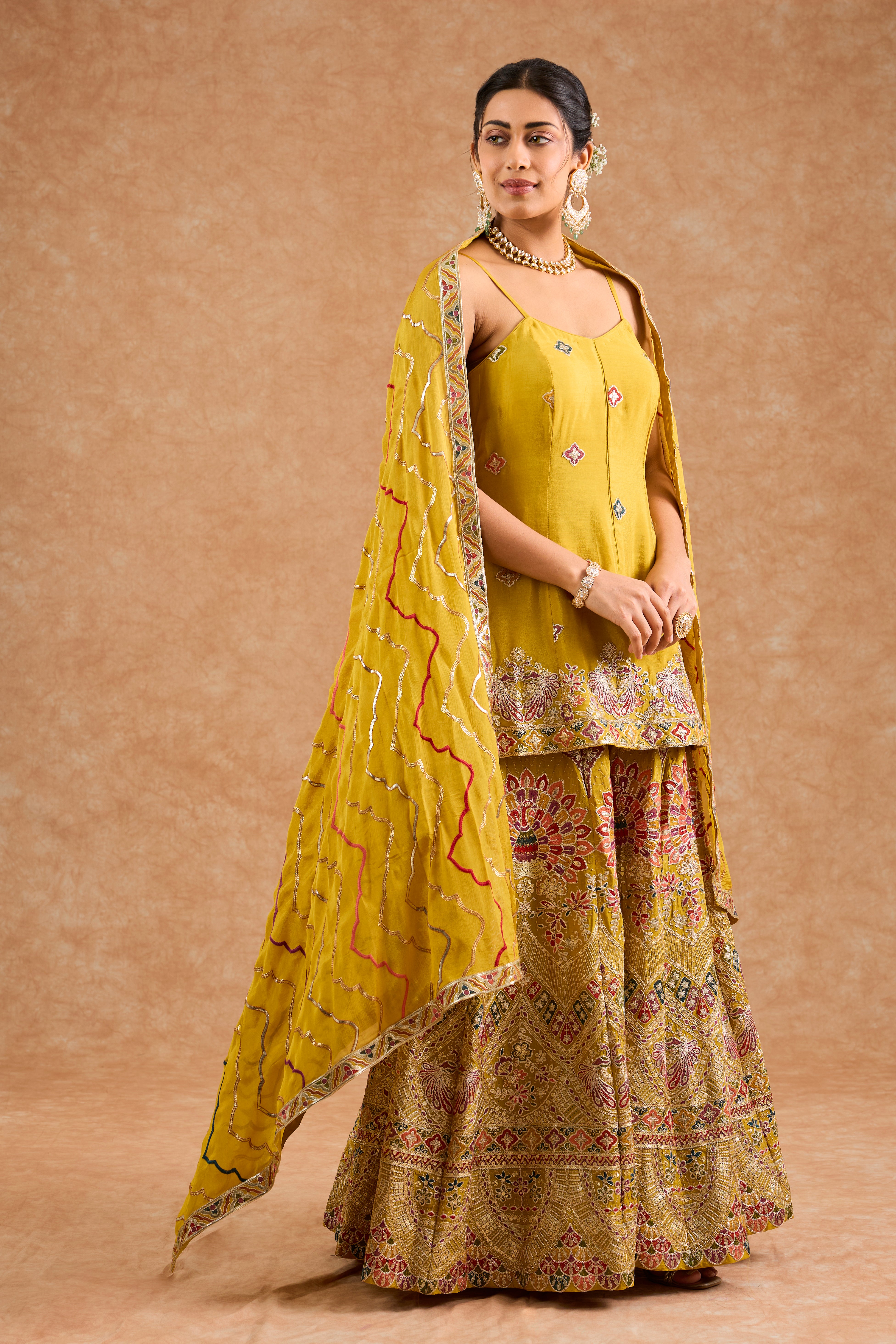 Mustard Chinon Multocolored Thread Work Peplum Sharara Set