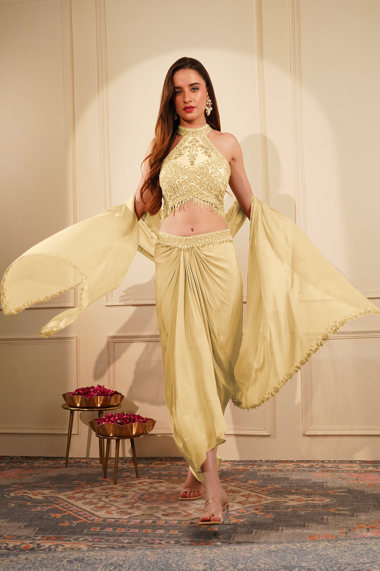 Cream Colour Crepe Drape Skirt Set With Heavy Hand Embroidered Halter Blouse And Dupatta