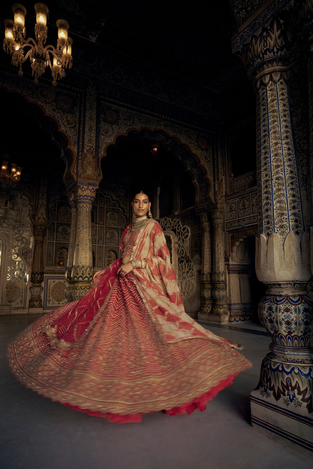 RED RAW SILK LEHENGA CHOLI WITH A NET DUPATTA