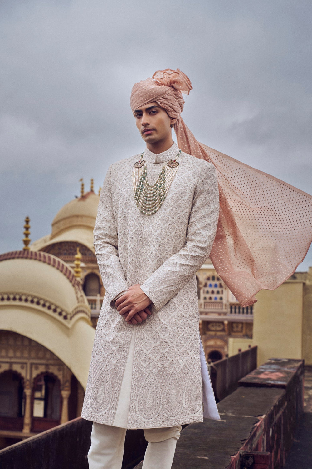 NUDE RAW SILK SHERWANI WITH KURTA CHURIDAR AND OPTIONAL WORKED STOLE, BELT AND JUTI