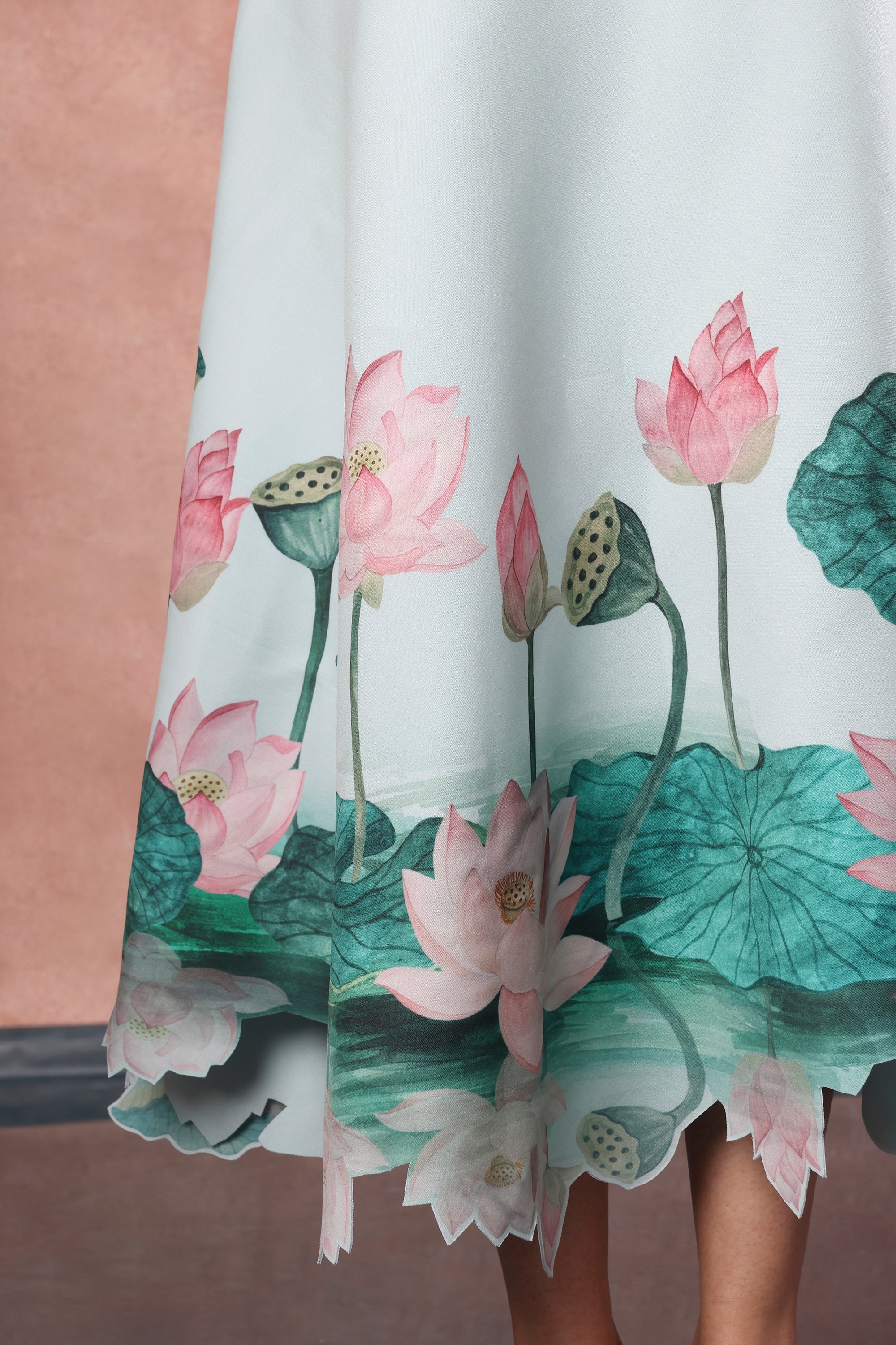 GREEN FLARED PRINTED DRESS WITH BOW WRAP