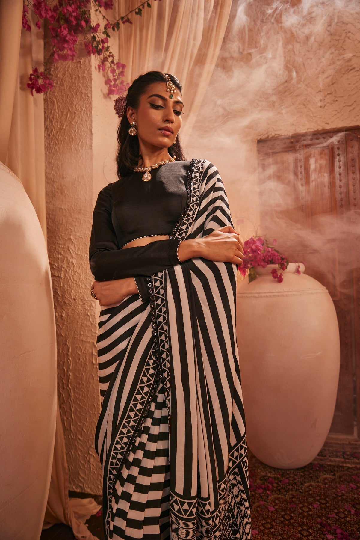 Black And White Saree With Intricate Motifs Paired With Black Full-Sleeved Blouse