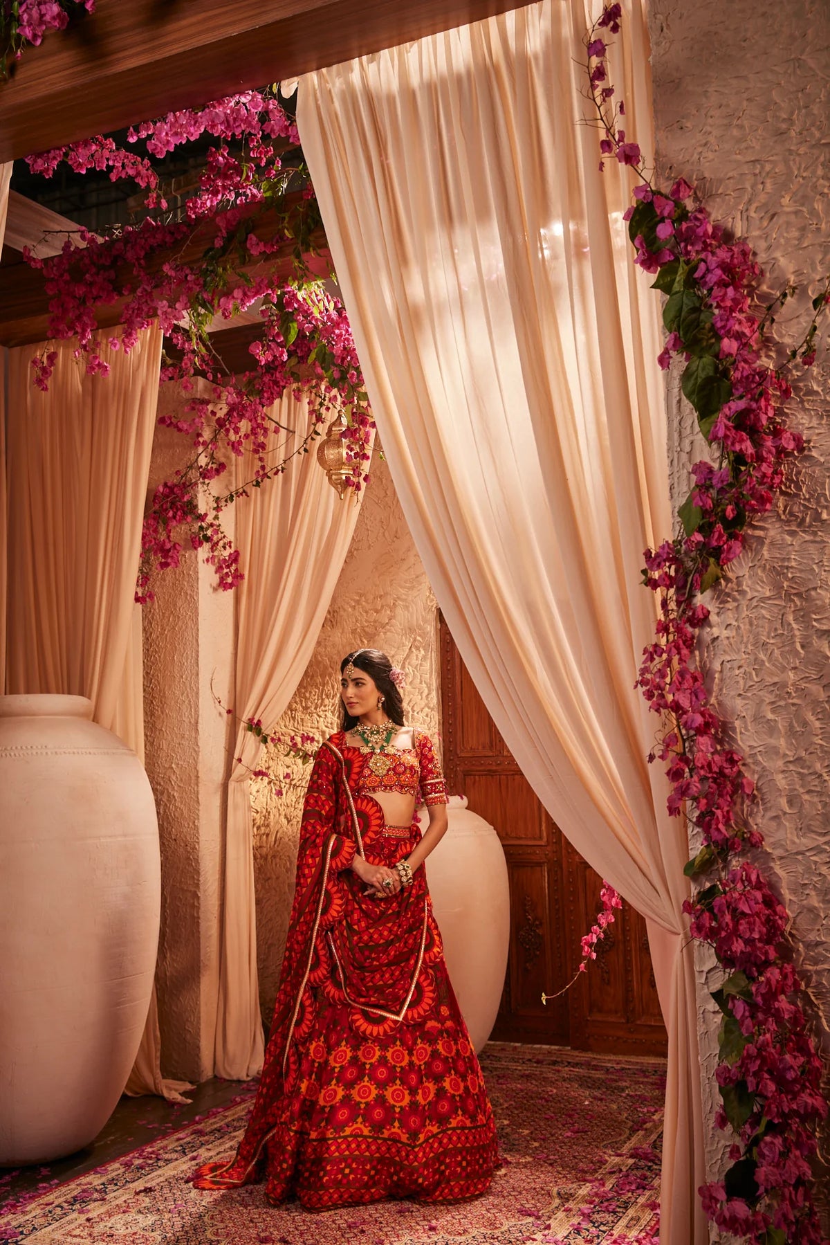 Red Lehenga Adorned With Intricate Floral And Geometric Prints