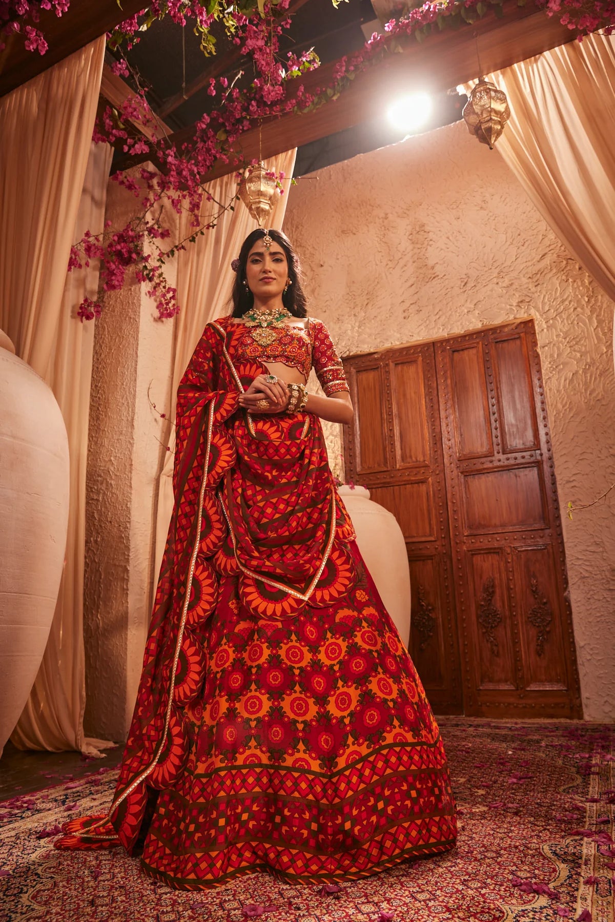 Red Lehenga Adorned With Intricate Floral And Geometric Prints