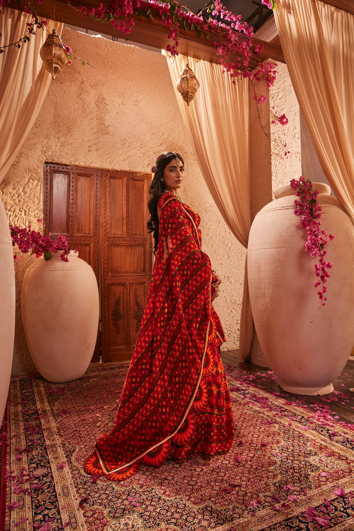 Red Lehenga Adorned With Intricate Floral And Geometric Prints