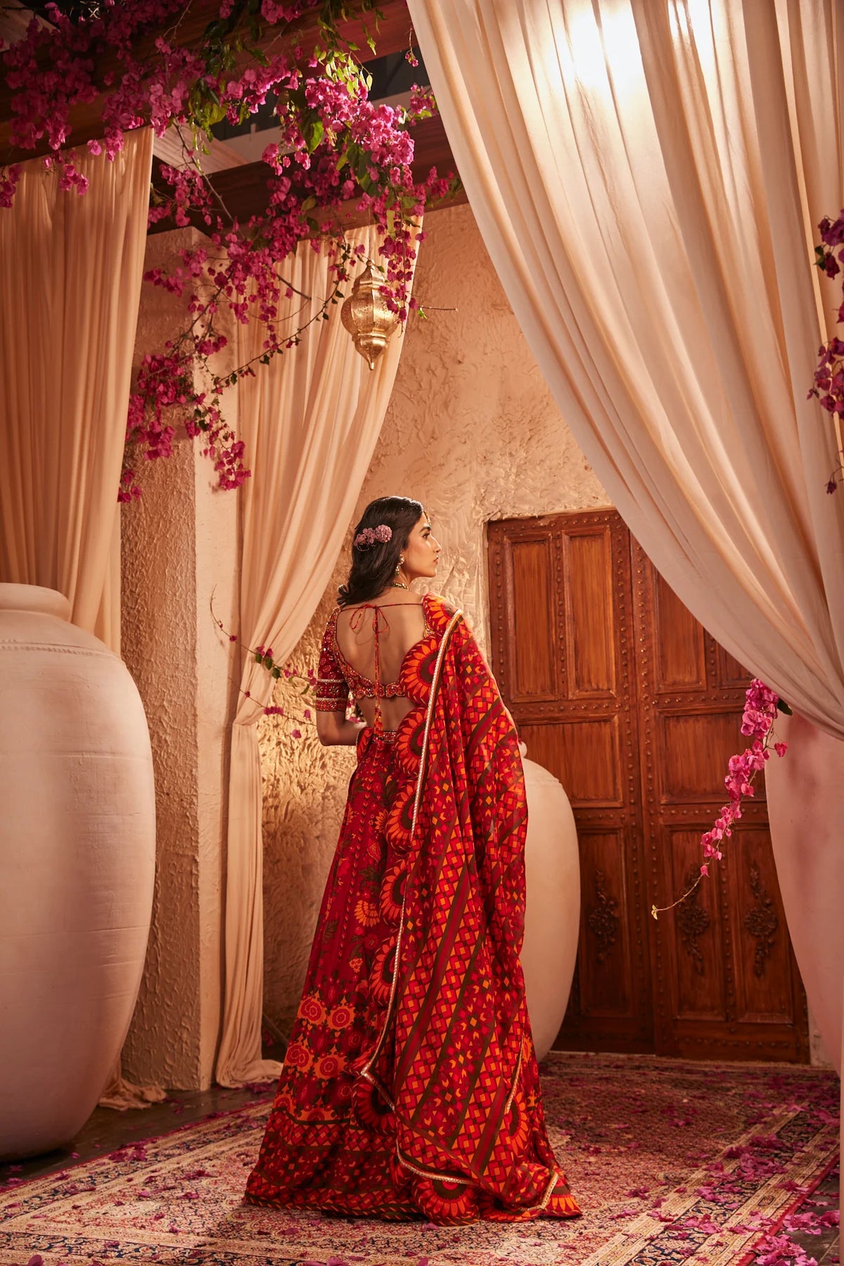 Red Lehenga Adorned With Intricate Floral And Geometric Prints
