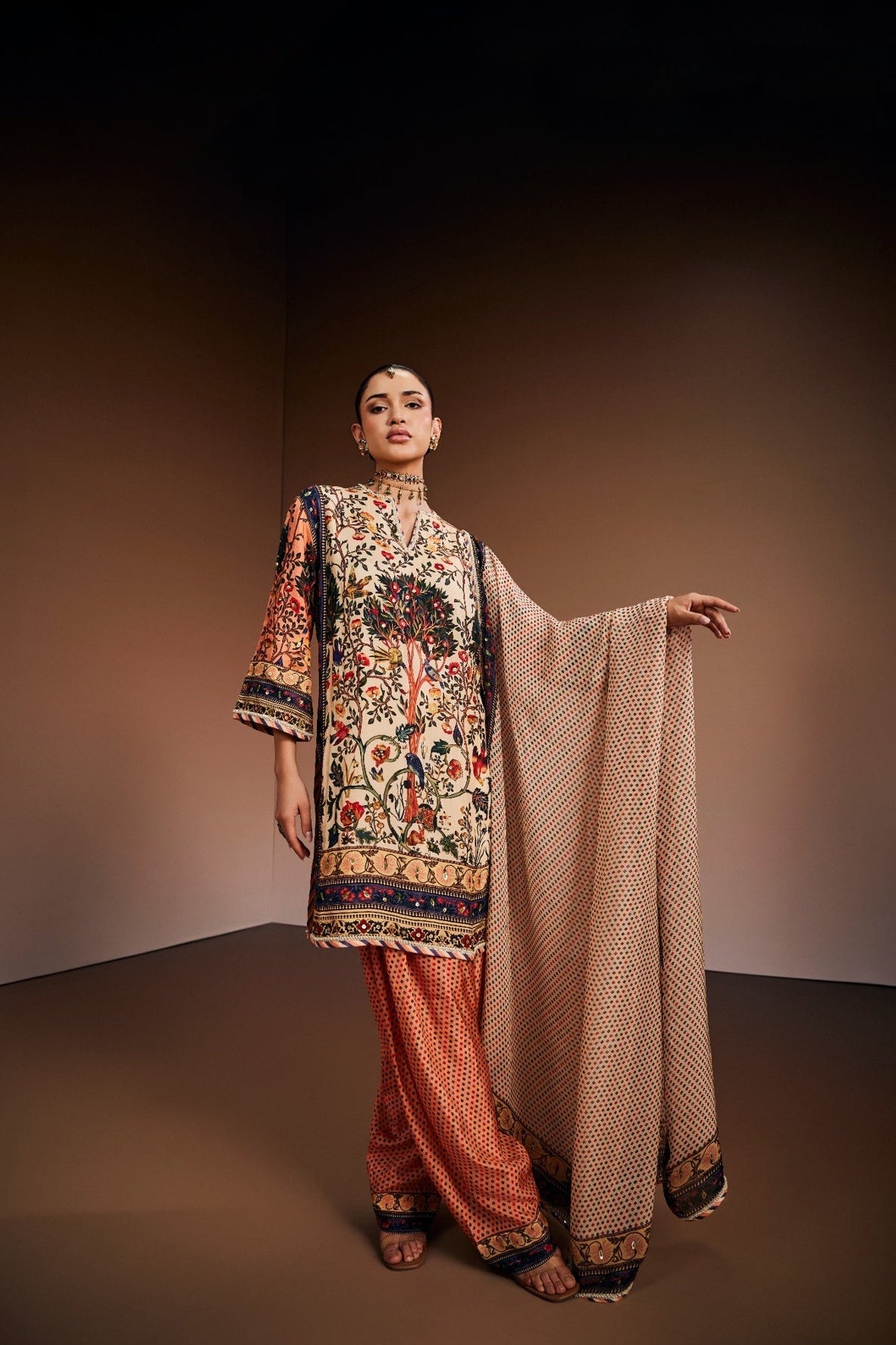 Ivory kurta set inspired with tree of life print.
