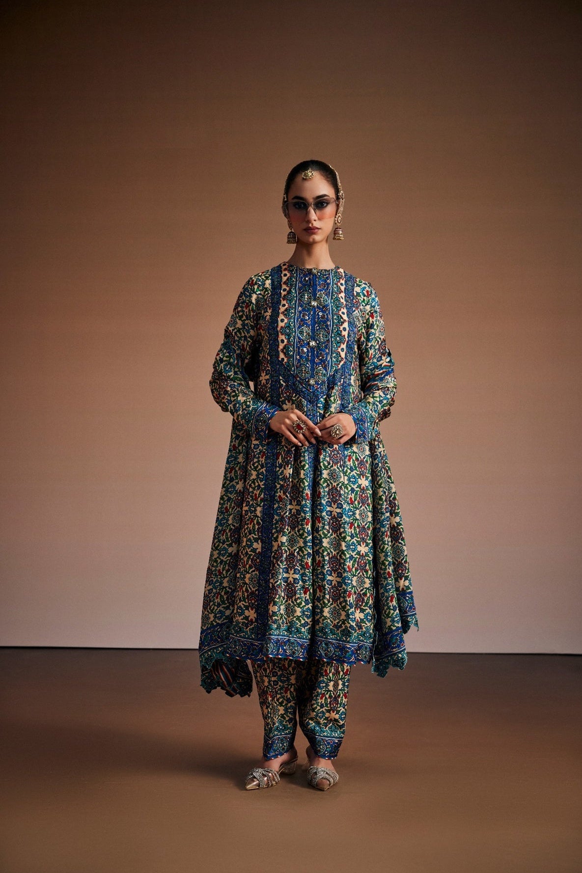 Floral printed anarkali paired with narrow pants and dupatta