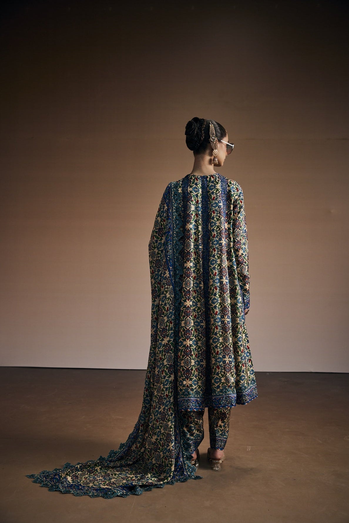 Floral printed anarkali paired with narrow pants and dupatta