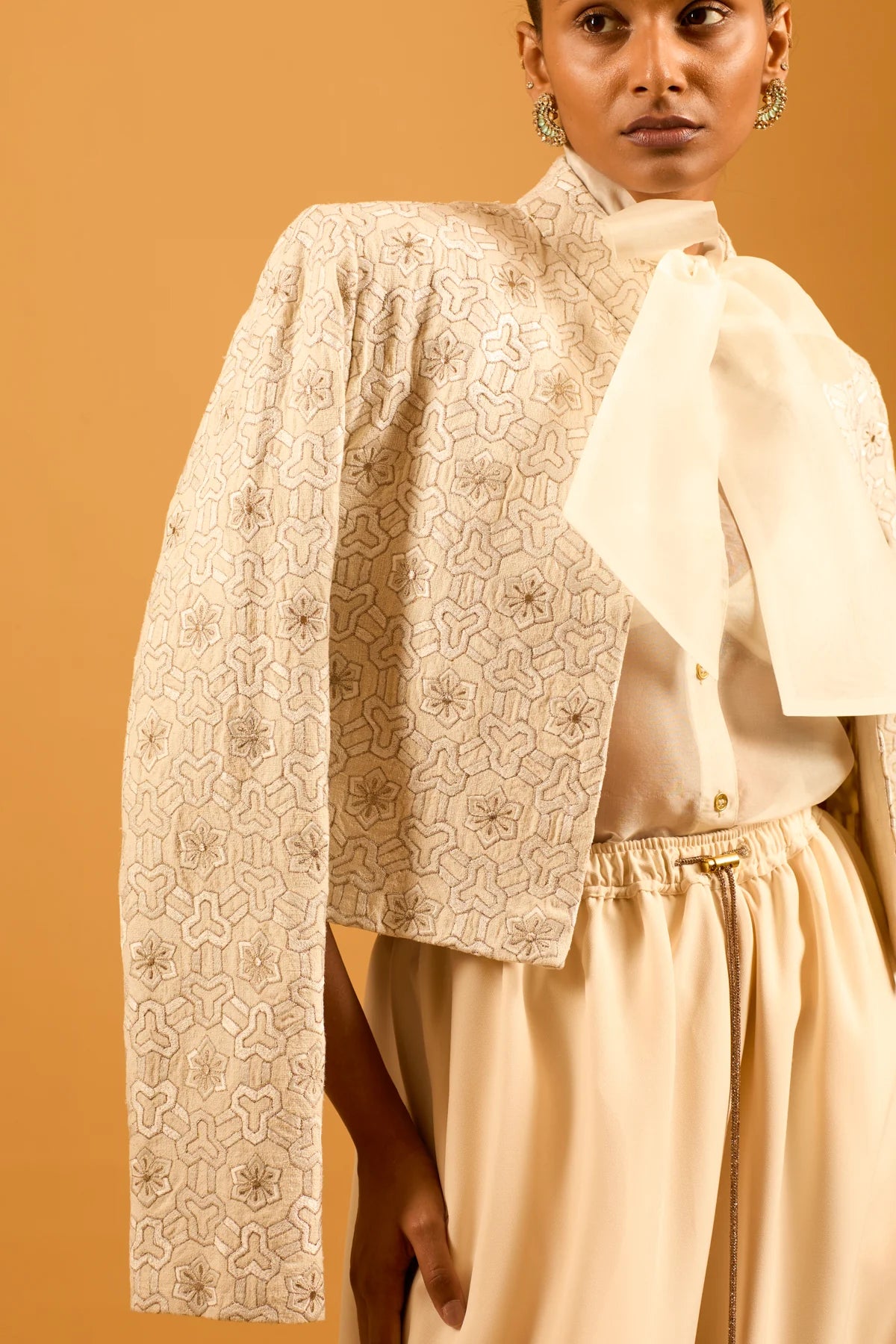 Trifecta ivory sheer pussy bow shirt