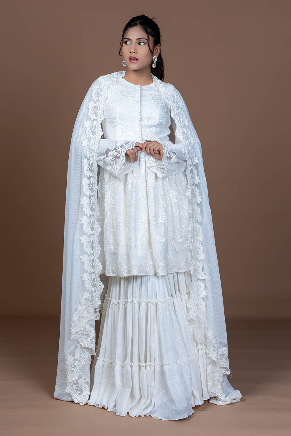 White cotton tiered garara set with short kurta, paired with Kota doria Dupatta