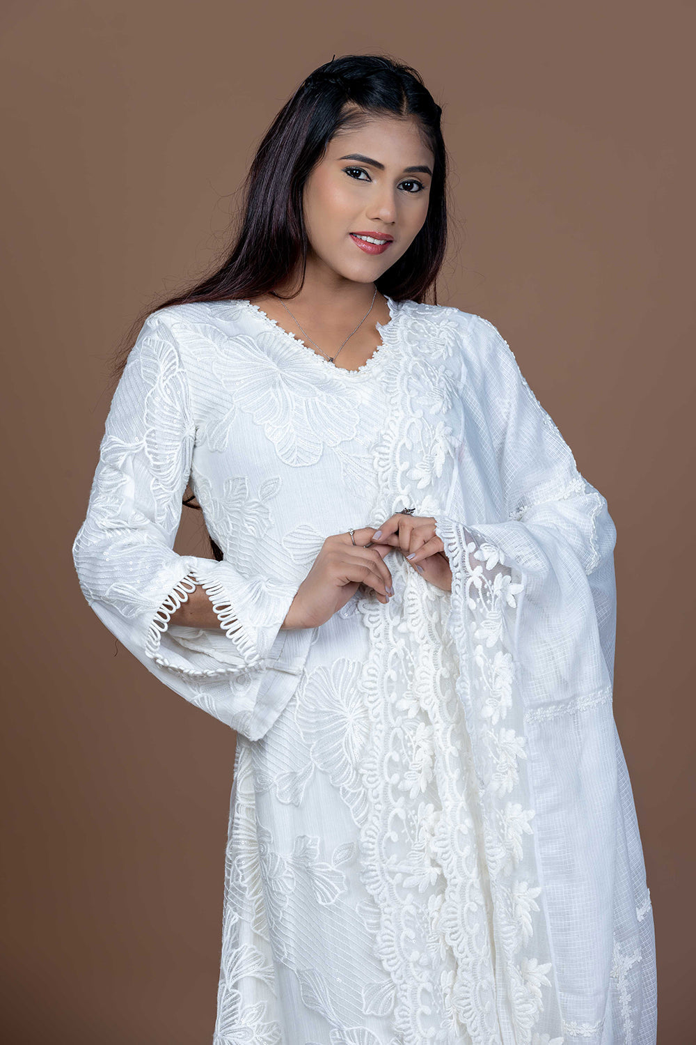 Lace embellished white kurta set paired with Kota doria dupatta