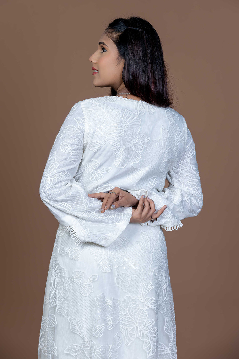 Lace embellished white kurta set paired with Kota doria dupatta