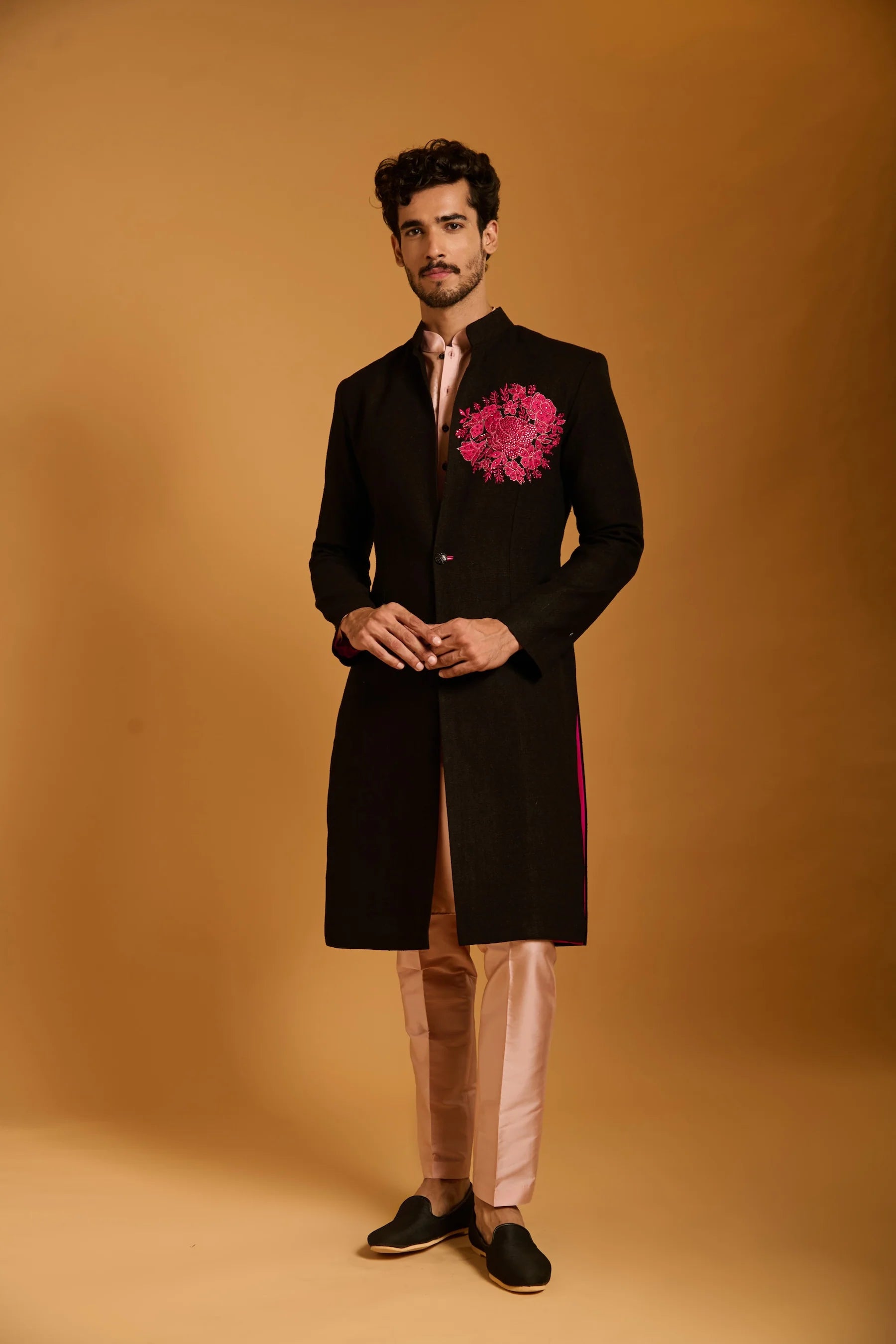 Trifecta black crest sherwani