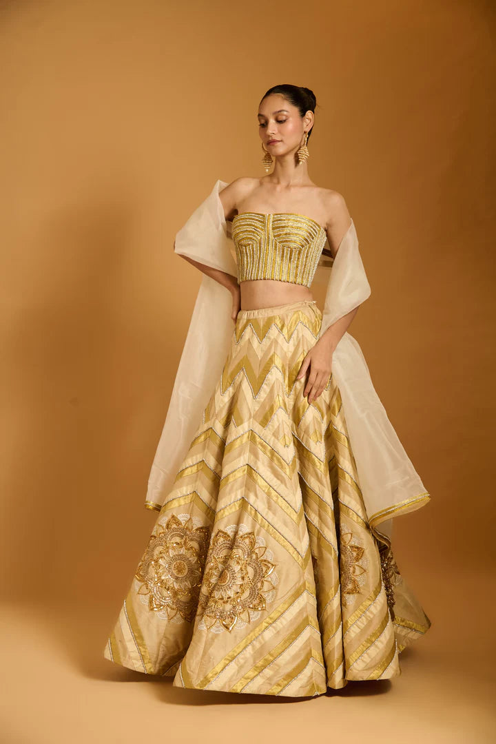 Trifecta cream-gold chevron lehenga