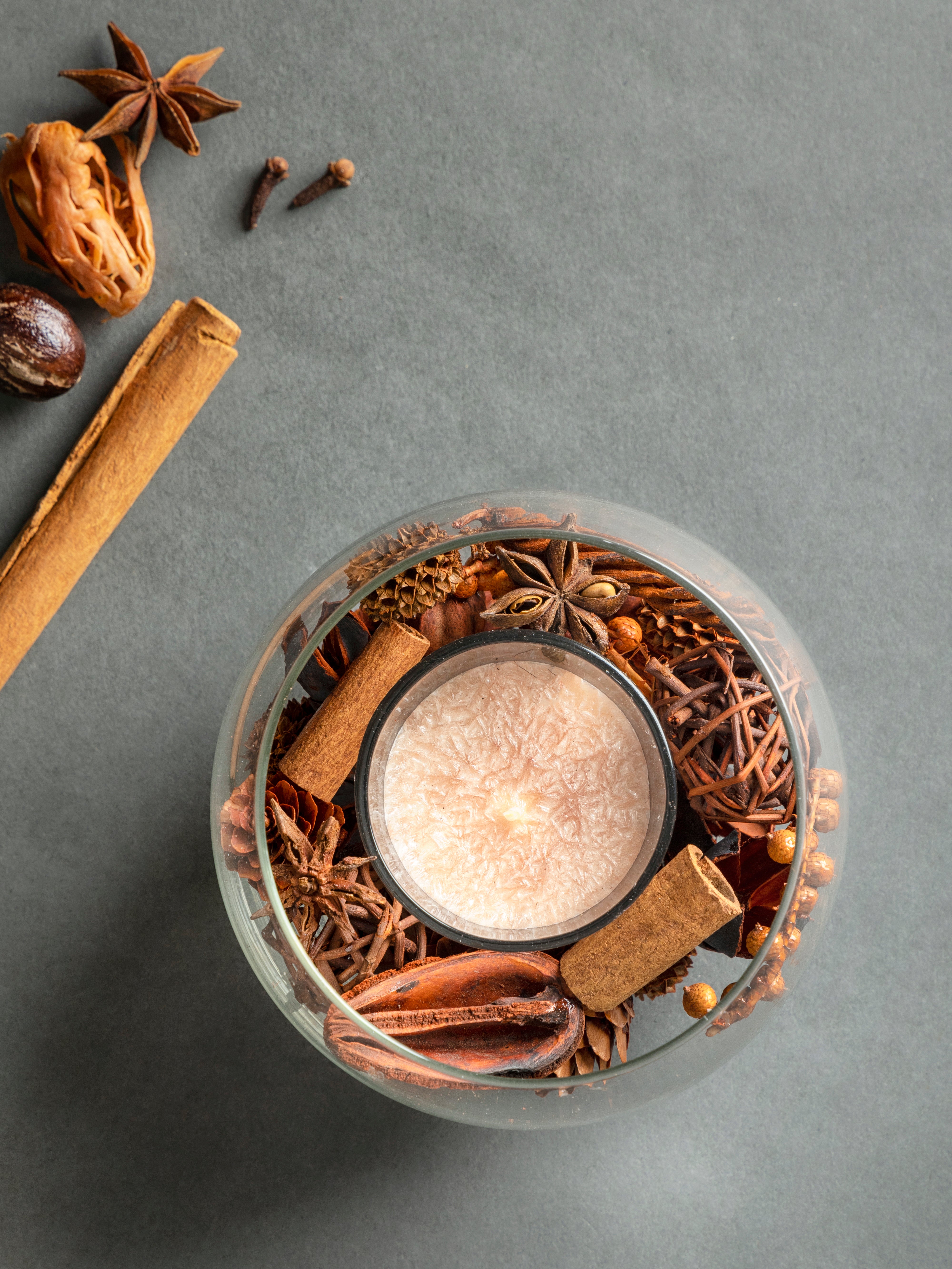 Mix spice potpourri glass bowl with candle