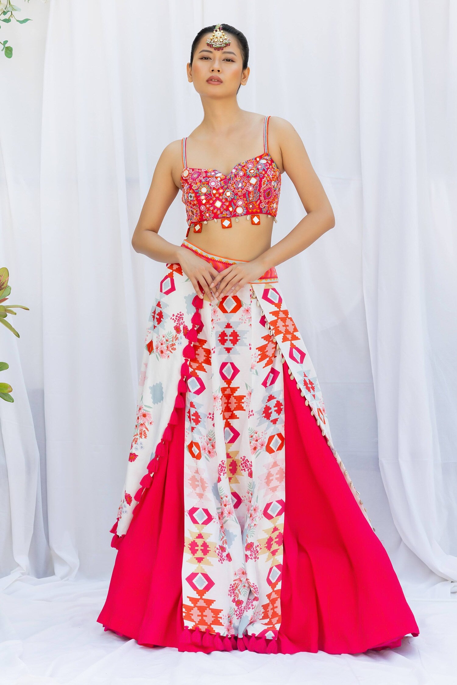 Fuchsia pink lehengas set with white kilim printed panels
