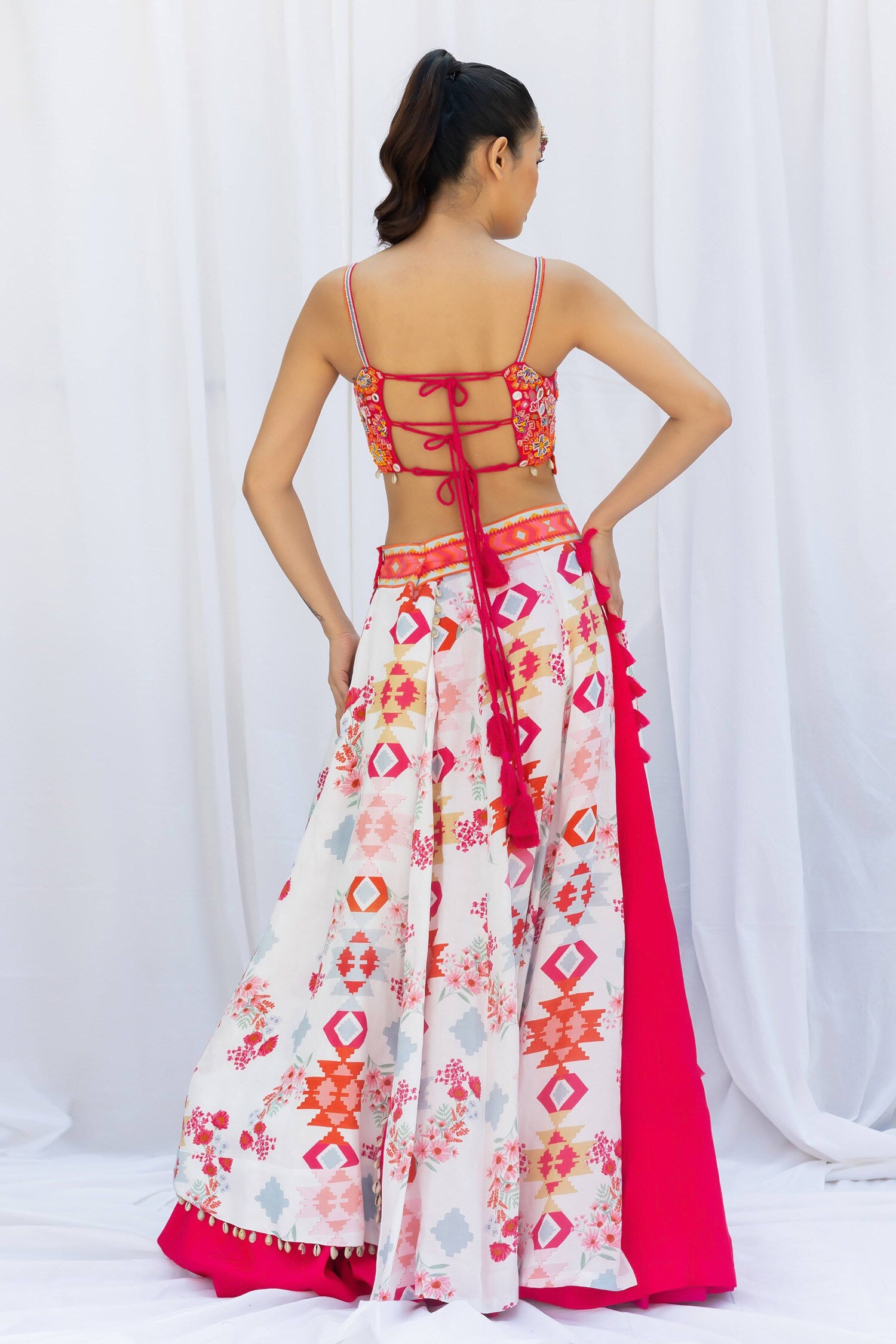 Fuchsia pink lehengas set with white kilim printed panels