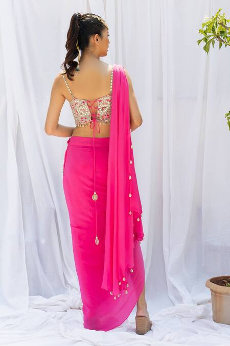 Fuchsia pink draped saree with embroidered choli