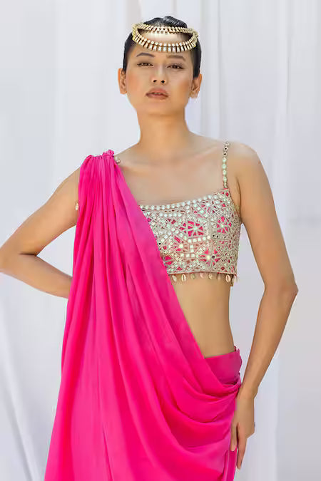 Fuchsia pink draped saree with embroidered choli