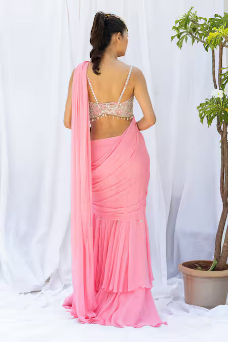 Pink frill saree with mirror-work choli