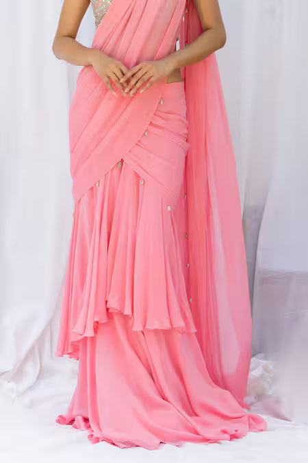 Pink frill saree with mirror-work choli