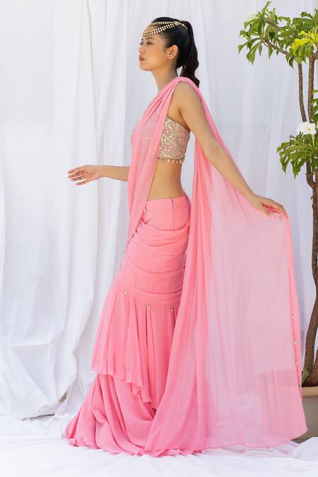 Pink frill saree with mirror-work choli