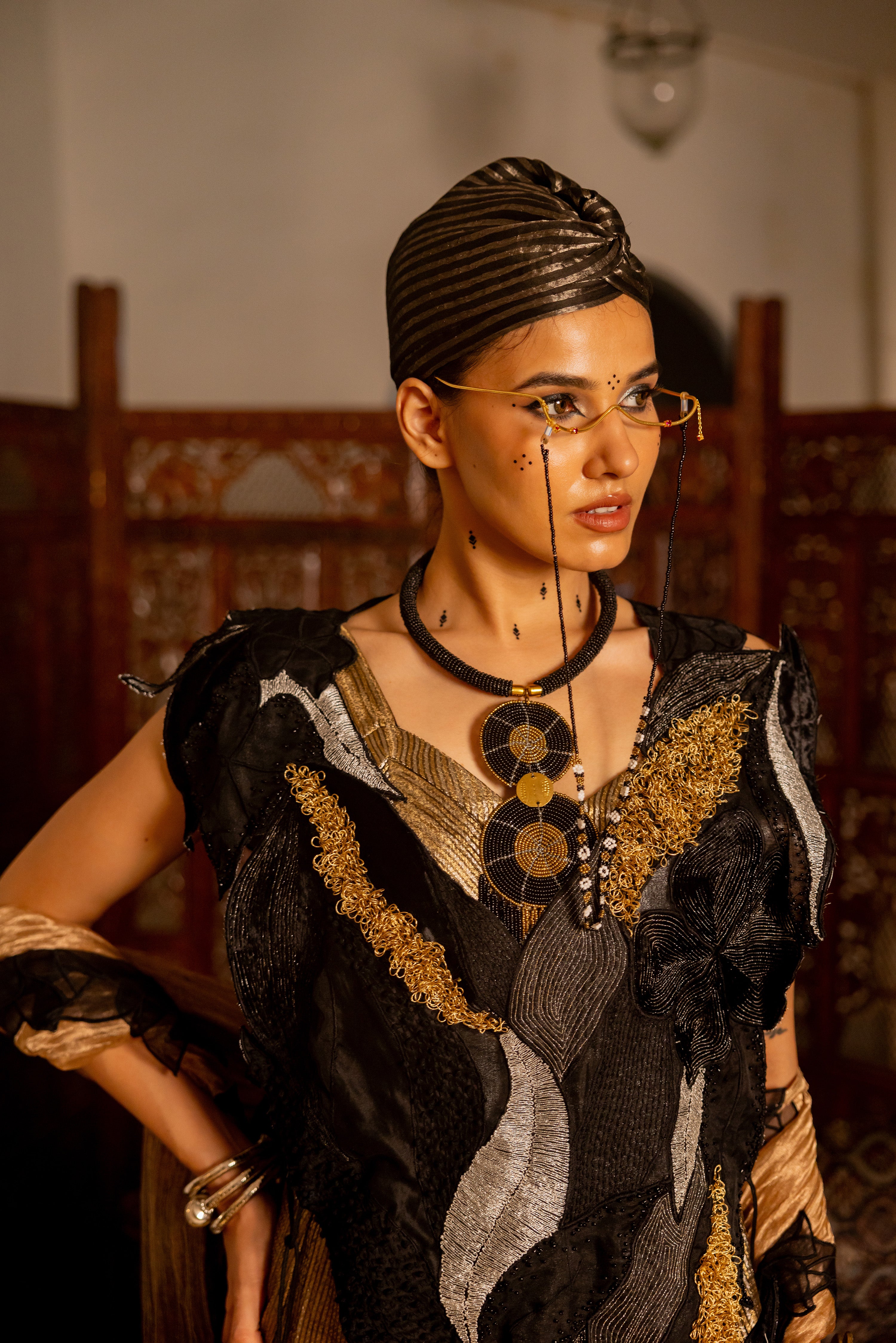 "BLACK OVERLAY WITH GOLDEN SKIRT BUSTIER AND DUPATTA ( indra)"