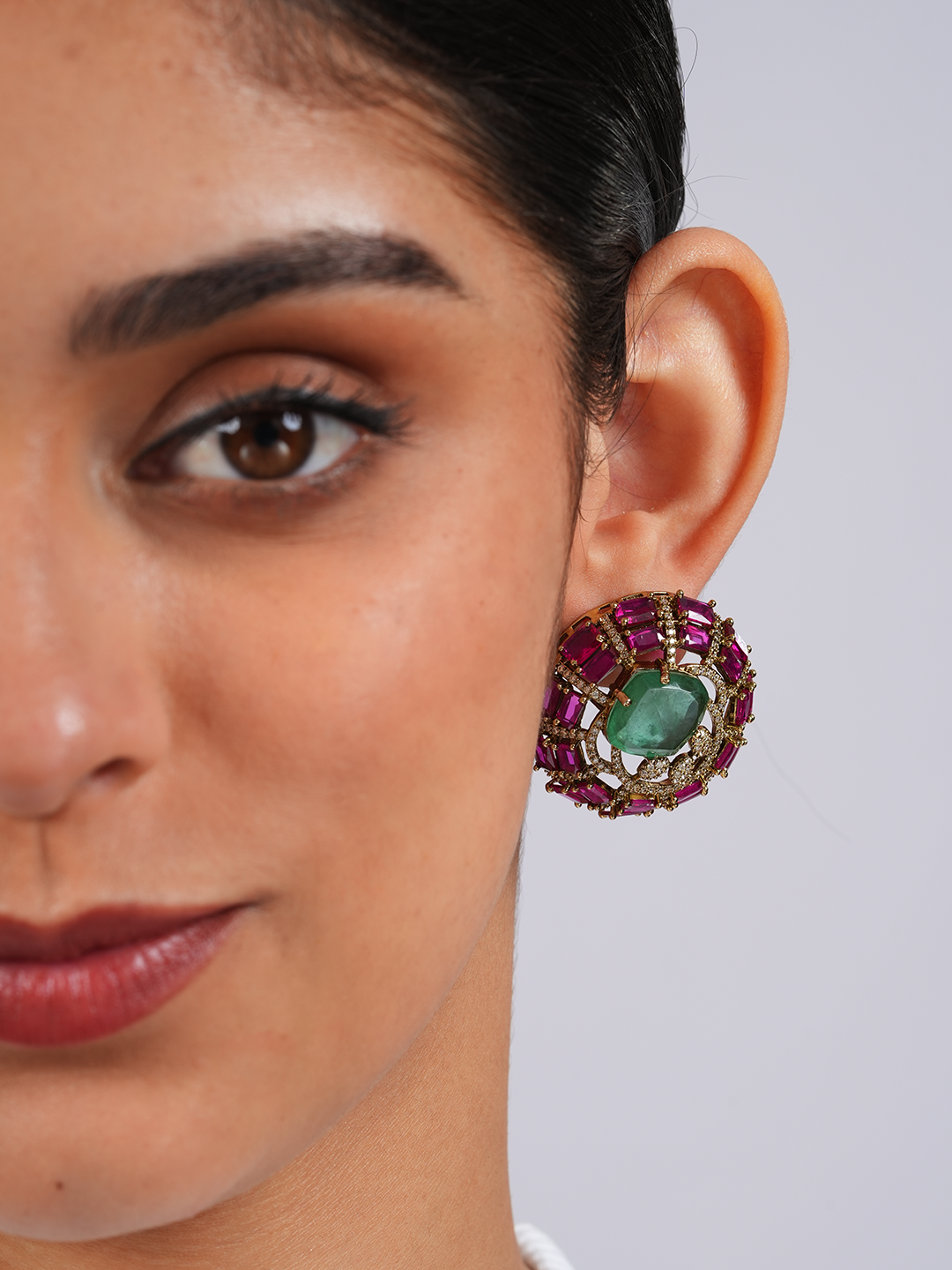 Emerald Statement Studs