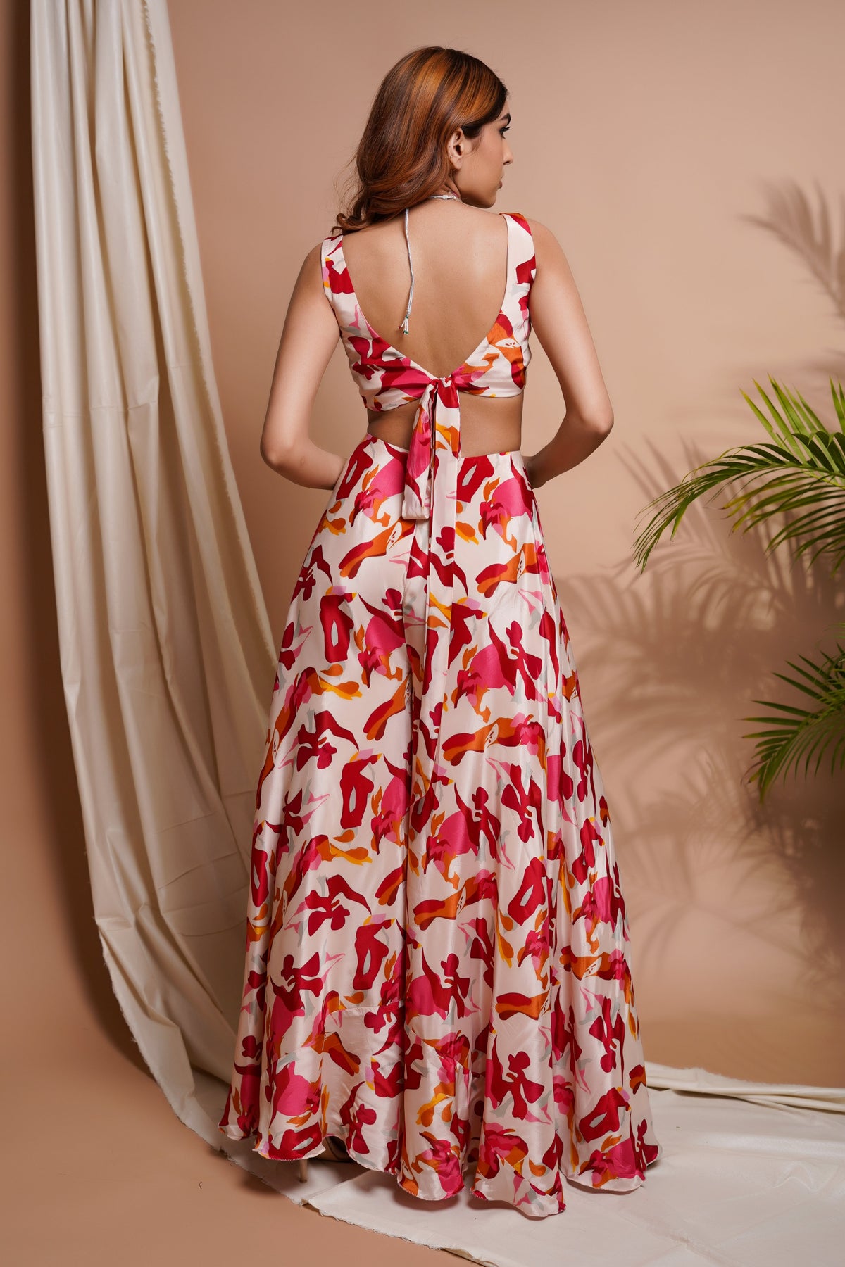 CREAM ABSTRACT PRINTED V-NECK JUMPSUIT