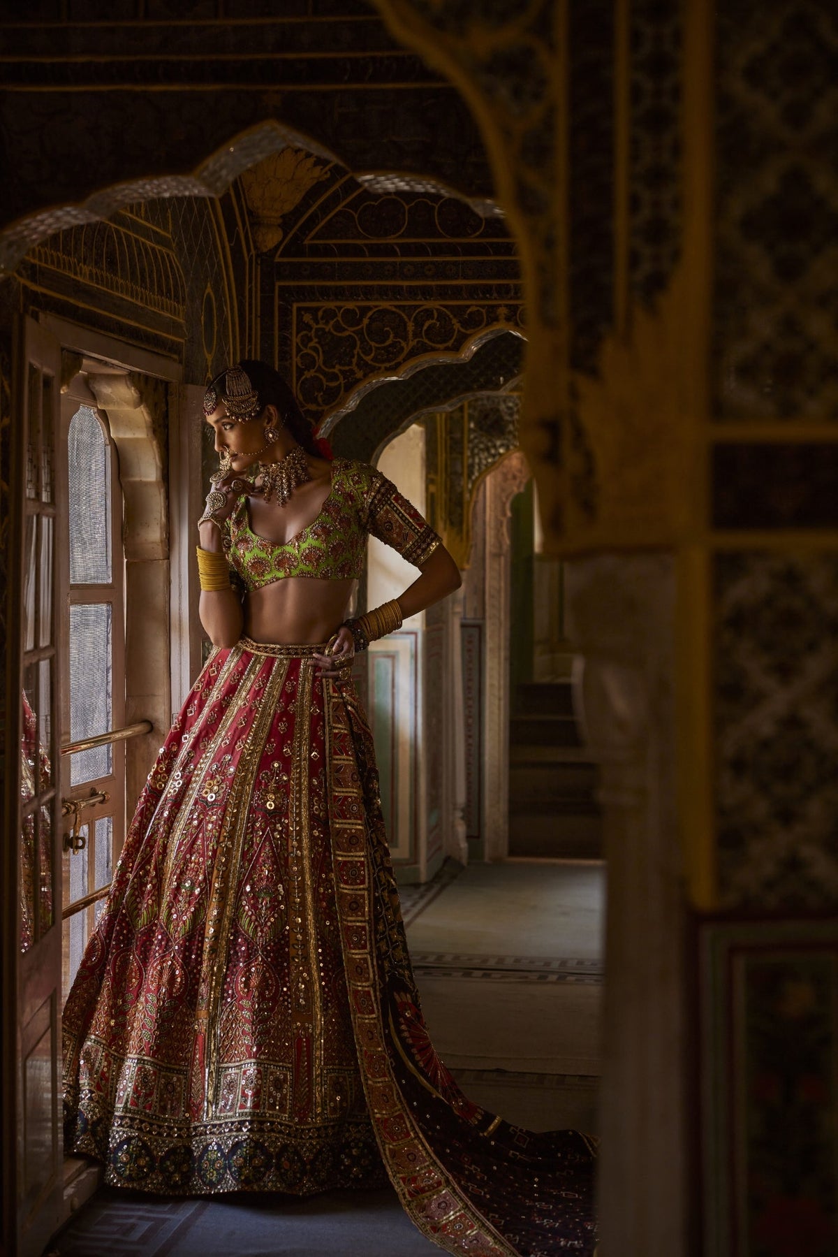 Green And Red Lehenga Set With Traditional Prints