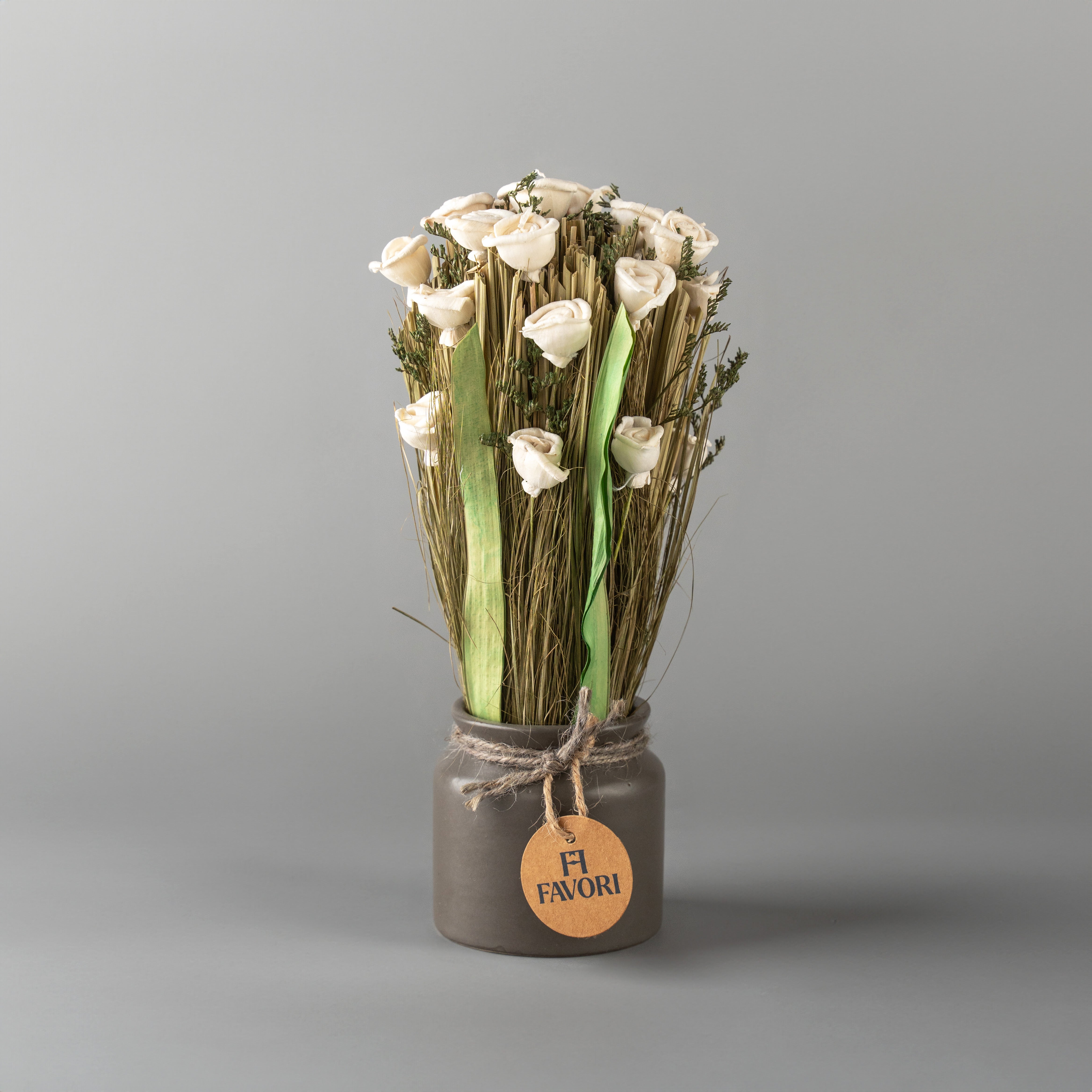 Serene Blooms - floral arrangement in grey ceramic vase