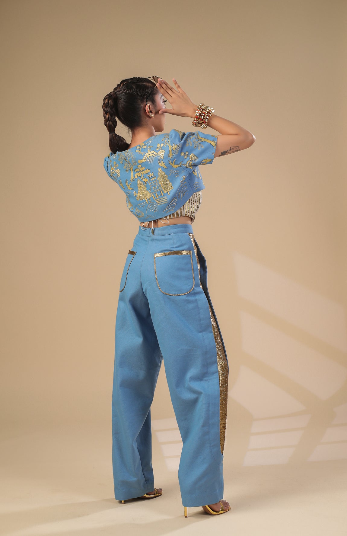 DENIM CROP JACKET WITH GOLD AND IVORY PLEATED CORSET WITH DENIM PANTS