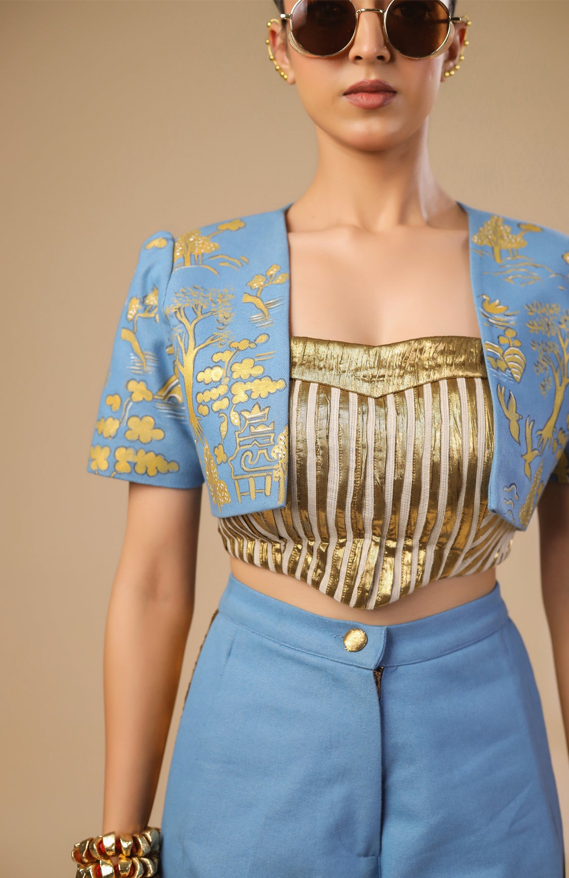 DENIM CROP JACKET WITH GOLD AND IVORY PLEATED CORSET WITH DENIM PANTS