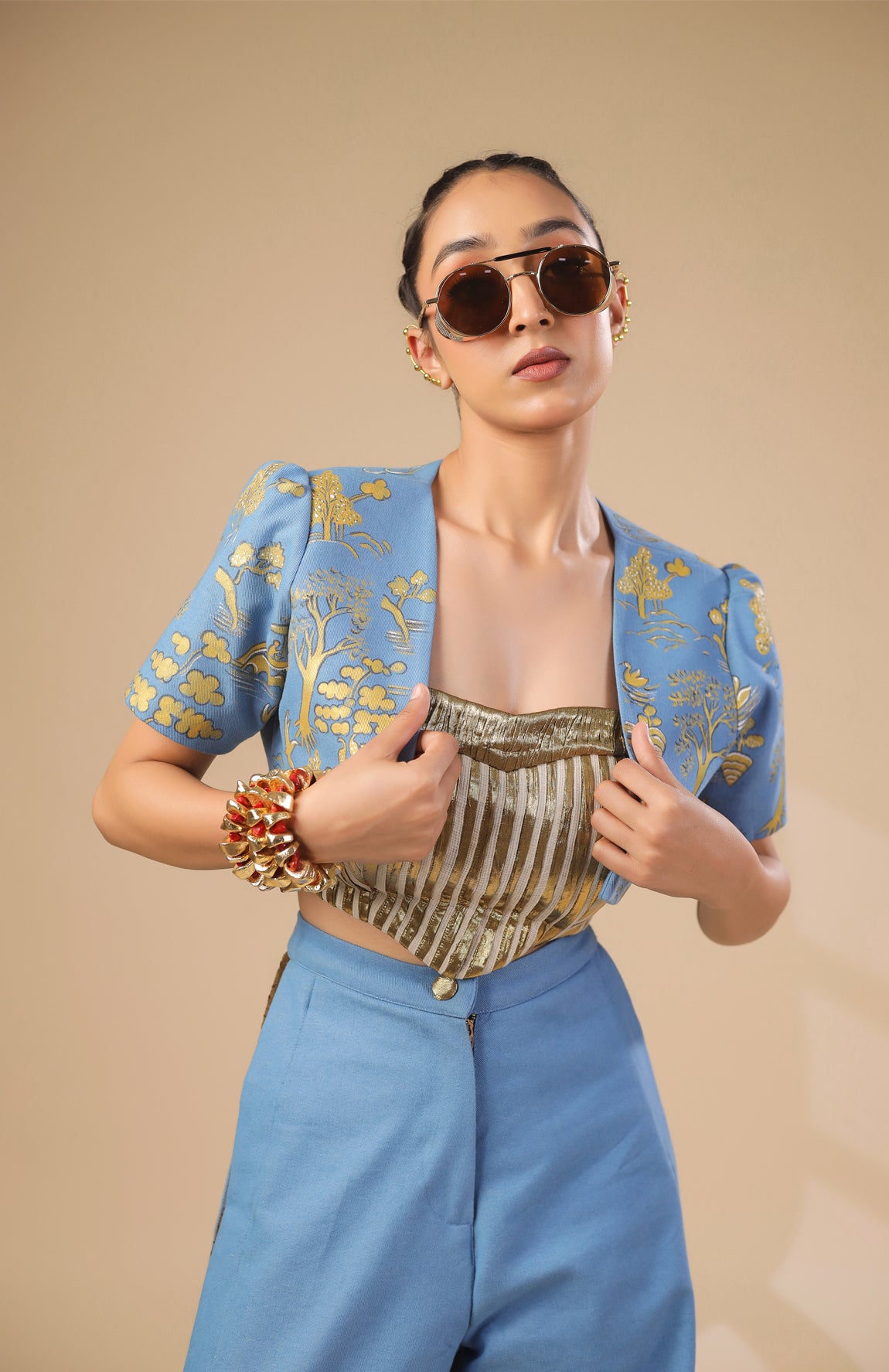 DENIM CROP JACKET WITH GOLD AND IVORY PLEATED CORSET WITH DENIM PANTS