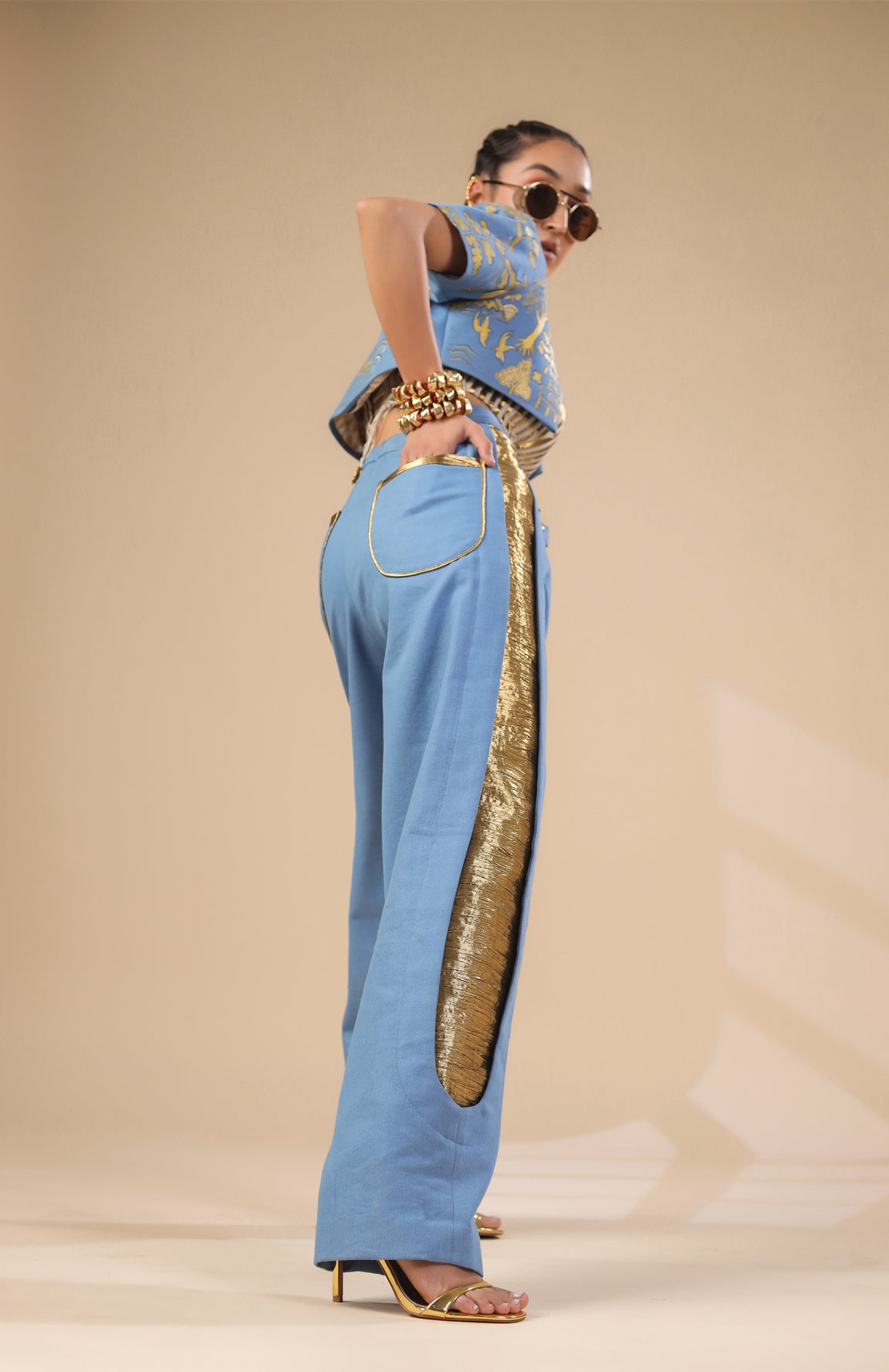 DENIM CROP JACKET WITH GOLD AND IVORY PLEATED CORSET WITH DENIM PANTS