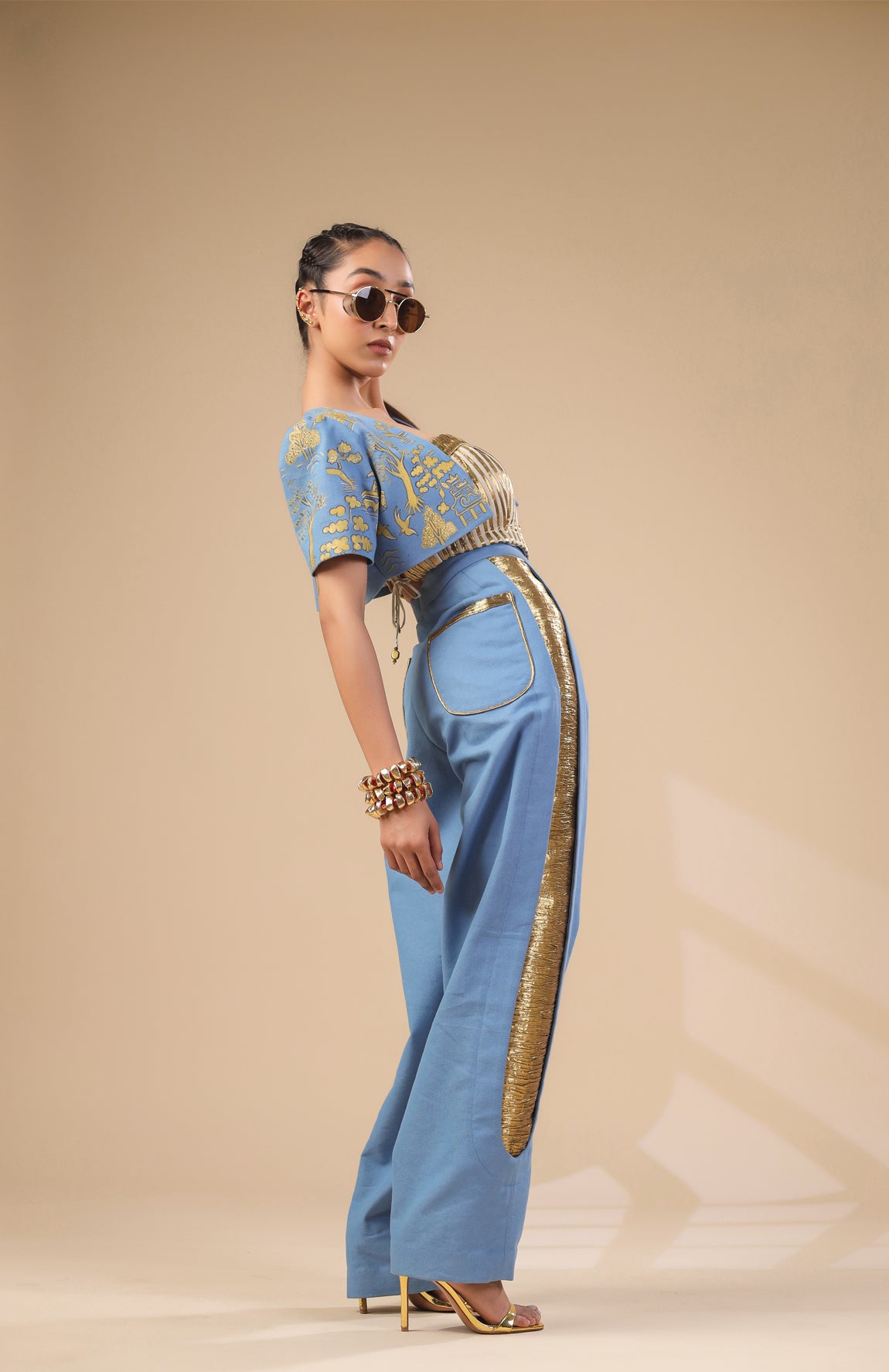 DENIM CROP JACKET WITH GOLD AND IVORY PLEATED CORSET WITH DENIM PANTS