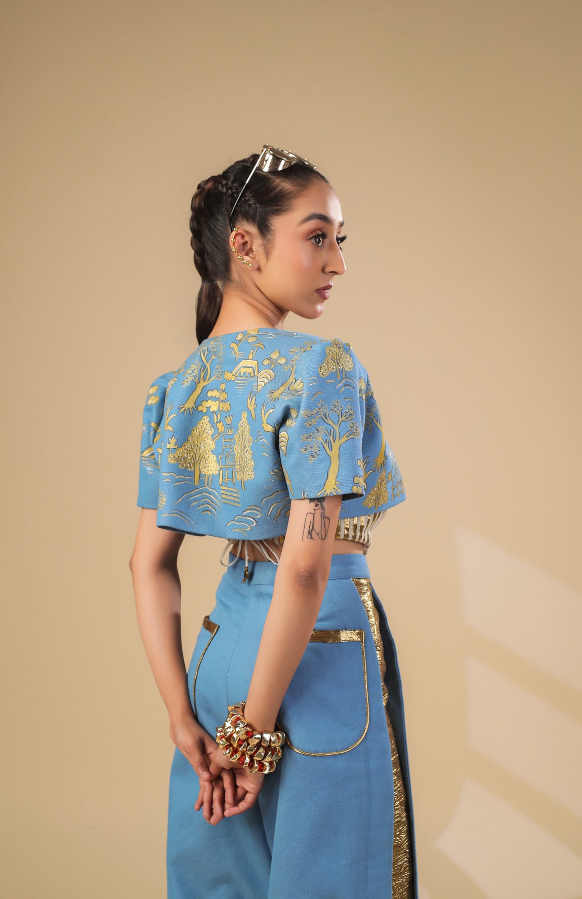 DENIM CROP JACKET WITH GOLD AND IVORY PLEATED CORSET WITH DENIM PANTS