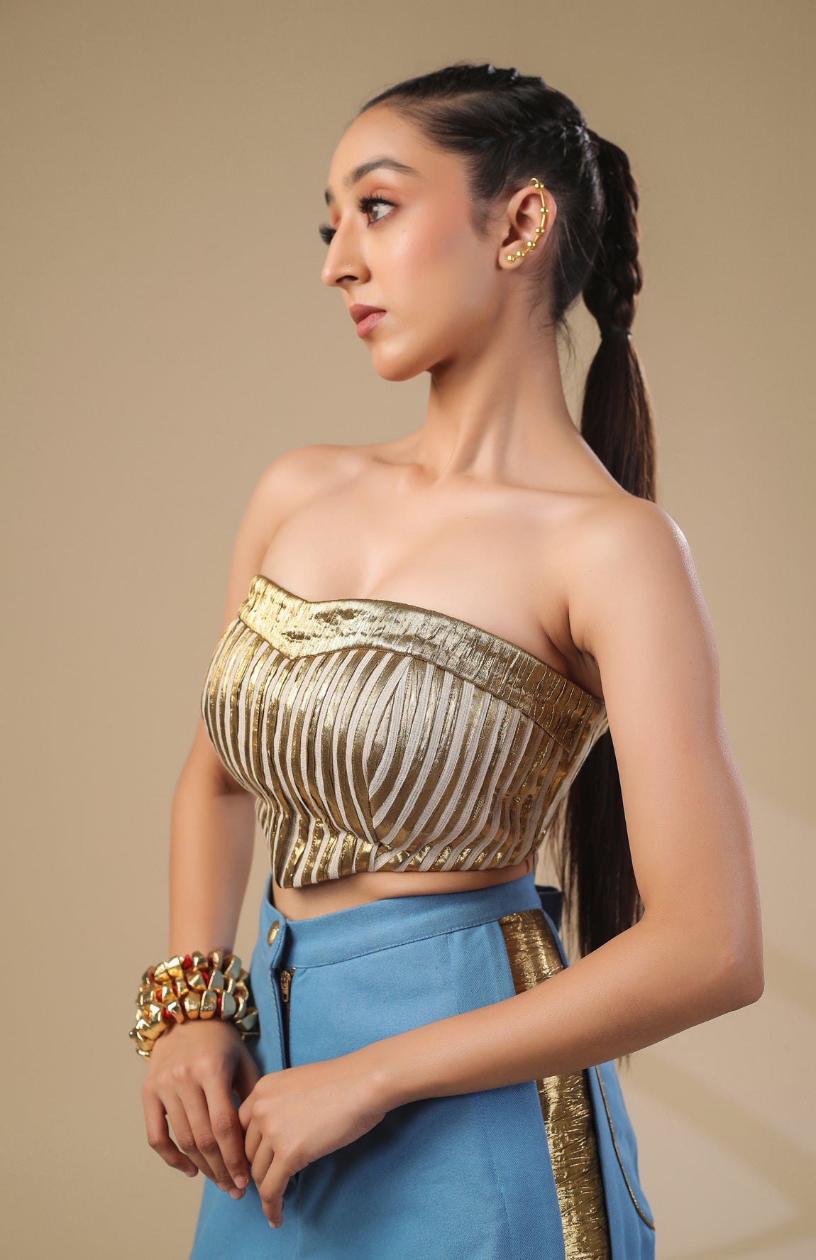 DENIM CROP JACKET WITH GOLD AND IVORY PLEATED CORSET WITH DENIM PANTS